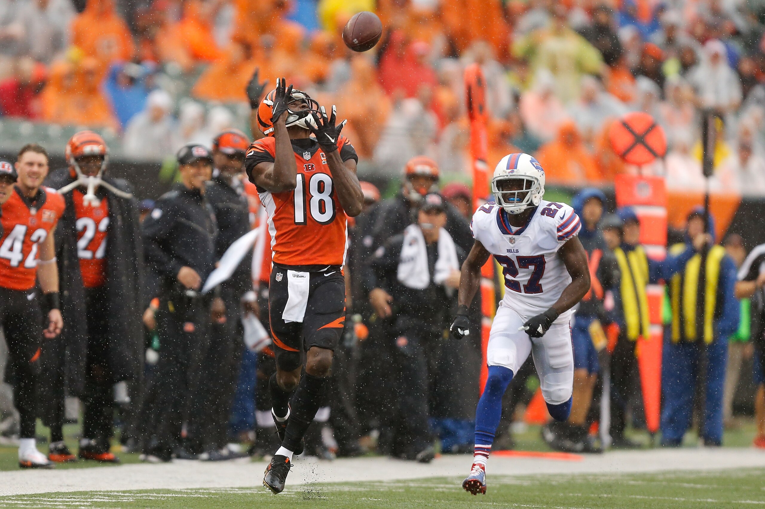 CINCINNATI, OH - OCTOBER 8: A.J. Green #18 of the Cincinnati Bengals catches a pass and runs it in for a touchdown while being defended by Tre'Davious White #27 of the Buffalo Bills during the first quarter at Paul Brown Stadium on October 8, 2017 in Cin CINCINNATI, OH - OCTOBER 8: A.J. Green #18 of the Cincinnati Bengals catches a pass and runs it in for a touchdown while being defended by Tre'Davious White #27 of the Buffalo Bills during the first quarter at Paul Brown Stadium on October 8, 2017 in Cin