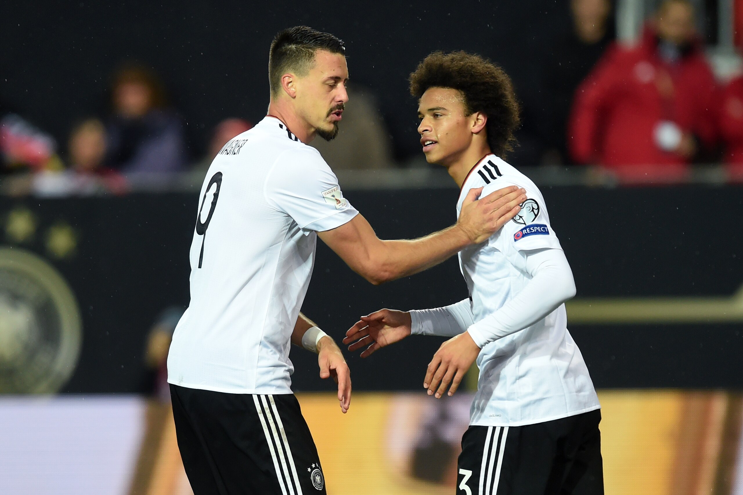 Germany's forward Sandro Wagner (L) celebrates scoring with his teammate Leroy Sane during the FIFA World Cup 2018 qualification football match between Germany and Azerbaijan in Mainz, western Germany, on October 8, 2017. / AFP PHOTO / Christof STACHE    