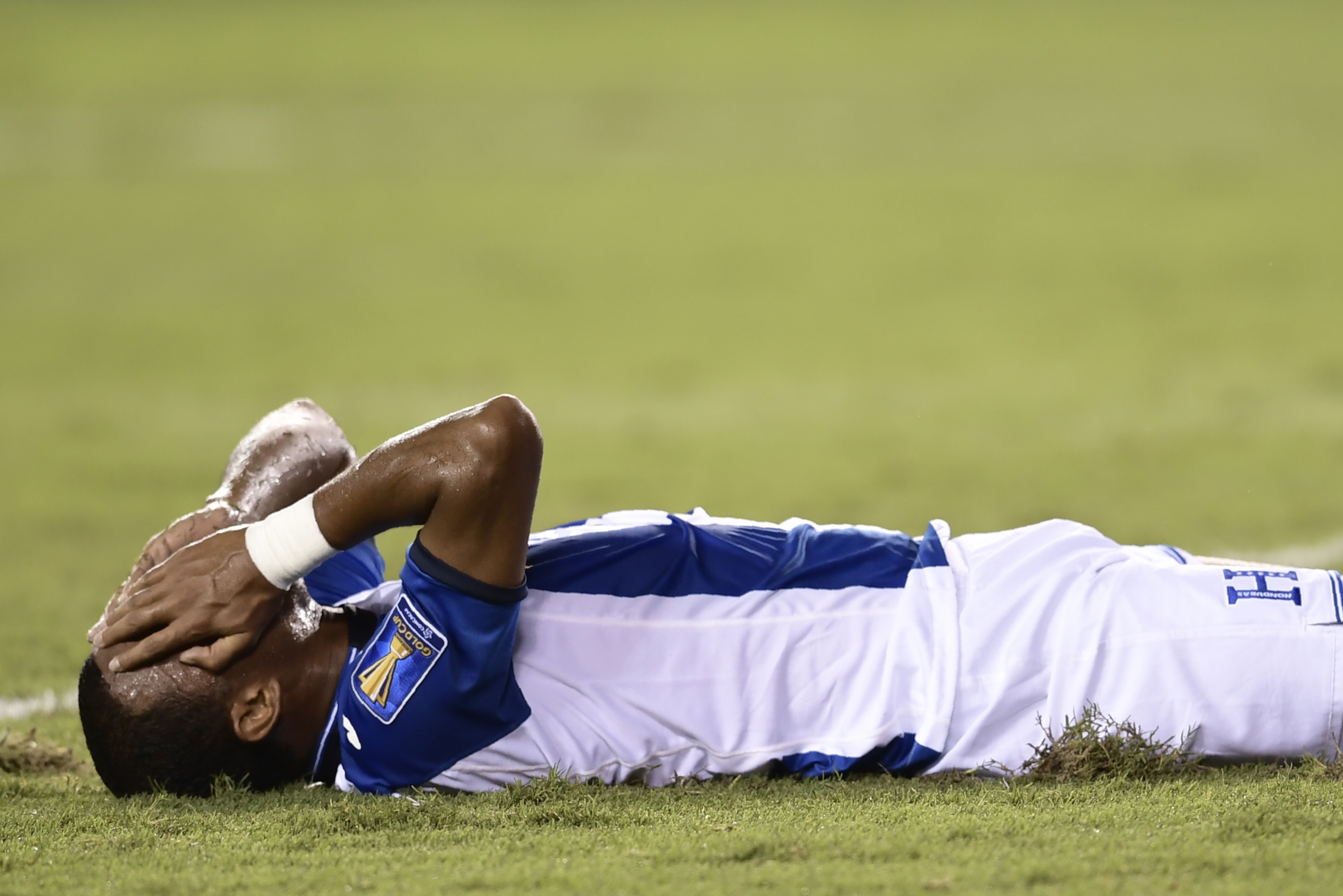 Honduras's forward Ovidio Lanza reacts to a missed goal attempt during the Honduras vs. French Guiana 2017 CONCACAF Gold Cup match at the BBVA Compass Stadium July 11, 2017 in Houston, Texas. / AFP PHOTO / Brendan Smialowski        (Photo credit should re