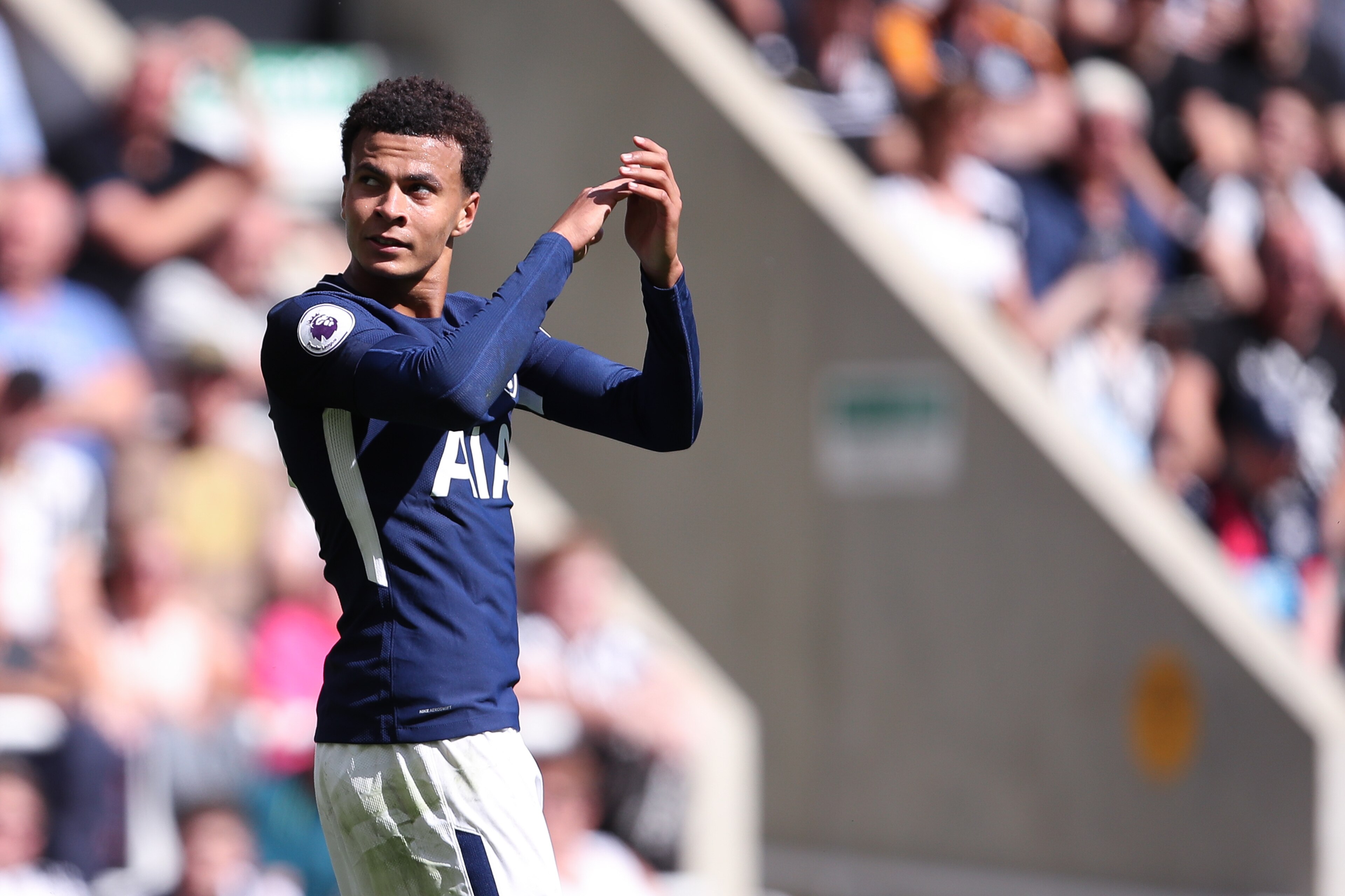 NEWCASTLE UPON TYNE, ENGLAND - AUGUST 13: Dele Alli of Tottenham Hotspur celebrates after scoring a goal to make it 0-1 during the Premier League match between Newcastle United and Tottenham Hotspur at St. James Park on August 13, 2017 in Newcastle upon T