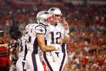 TAMPA, FL - OCTOBER 5:  Wide receiver Chris Hogan #15 of the New England Patriots celebrates with quarterback Tom Brady #12 after hauling in a 5-yard touchdown pass from Brady during the second quarter of an NFL football game Tampa Bay Buccaneers on Octob
