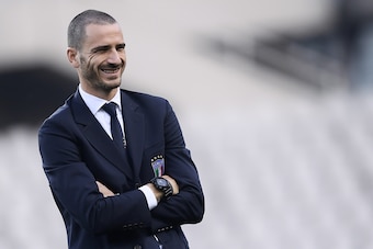 Italy's defender Leonardo Bonucci walks around the 'Grande Torino Stadium' on the eve of the FIFA World Cup 2018 qualification football match between Italy and Macedonia on October 5, 2017 in Turin.  / AFP PHOTO / MARCO BERTORELLO        (Photo credit sho