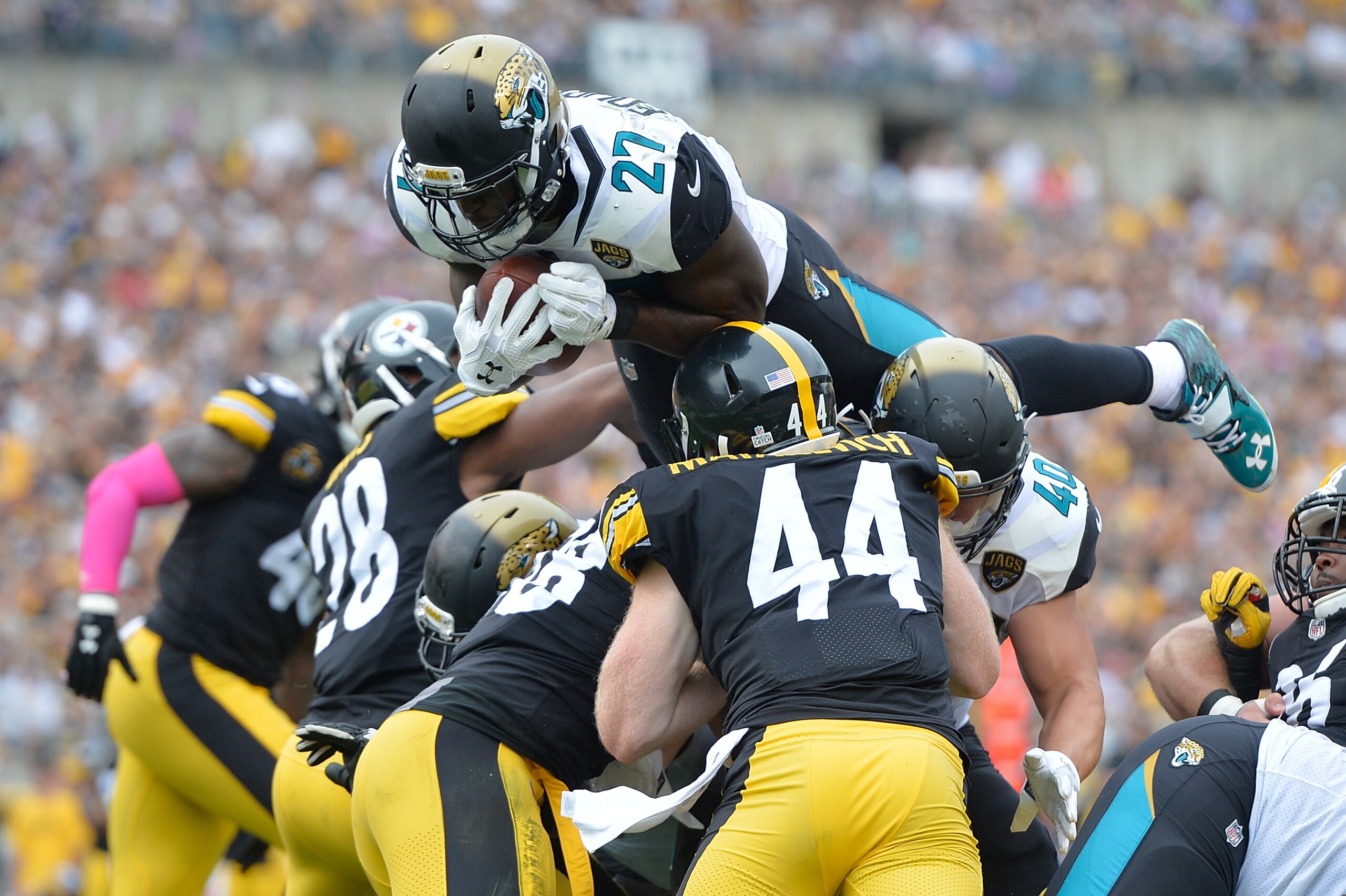 PITTSBURGH, PA - OCTOBER 08: Leonard Fournette #27 of the Jacksonville Jaguars dives into the end zone for a 2 yard touchdown in the second quarter during the game against the Pittsburgh Steelers at Heinz Field on October 8, 2017 in Pittsburgh, Pennsylvan