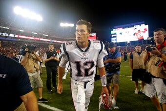 TAMPA, FL - OCTOBER 5:  Quarterback Tom Brady #12 of the New England Patriots makes his way off the field following the Patriots' 19-14 win over the Tampa Bay Buccaneers at an NFL football game on October 5, 2017 at Raymond James Stadium in Tampa, Florida