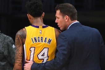 LOS ANGELES, CA - JANUARY 31:  Head coach Luke Walton of the Los Angeles Lakers talks with Brandon Ingram #14 on the bench in the second half of the game against the Denver Nuggets at Staples Center on January 31, 2017 in Los Angeles, California. Lakers w