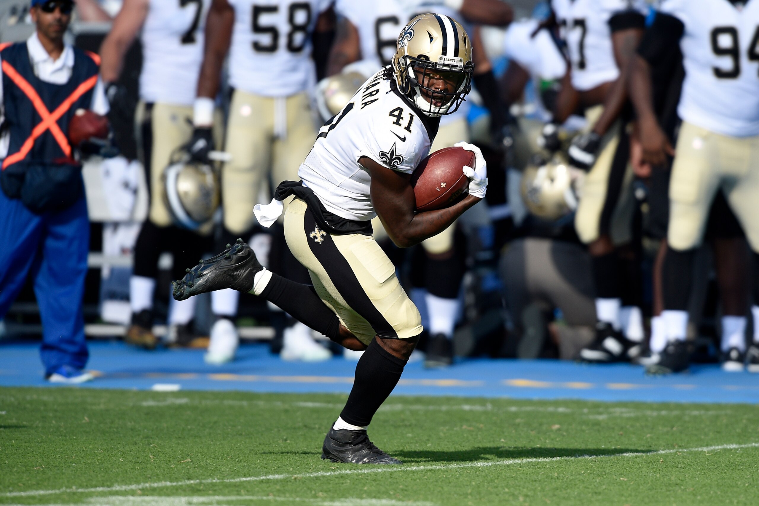 CARSON, CA - AUGUST 20: Running back Alvin Kamara #41 of the New Orleans Saints rushes for a touchdown against the Los Angeles Chargers during the first half of a preseason football game at the StubHub Center August 20, 2017, in Carson, California. (Photo