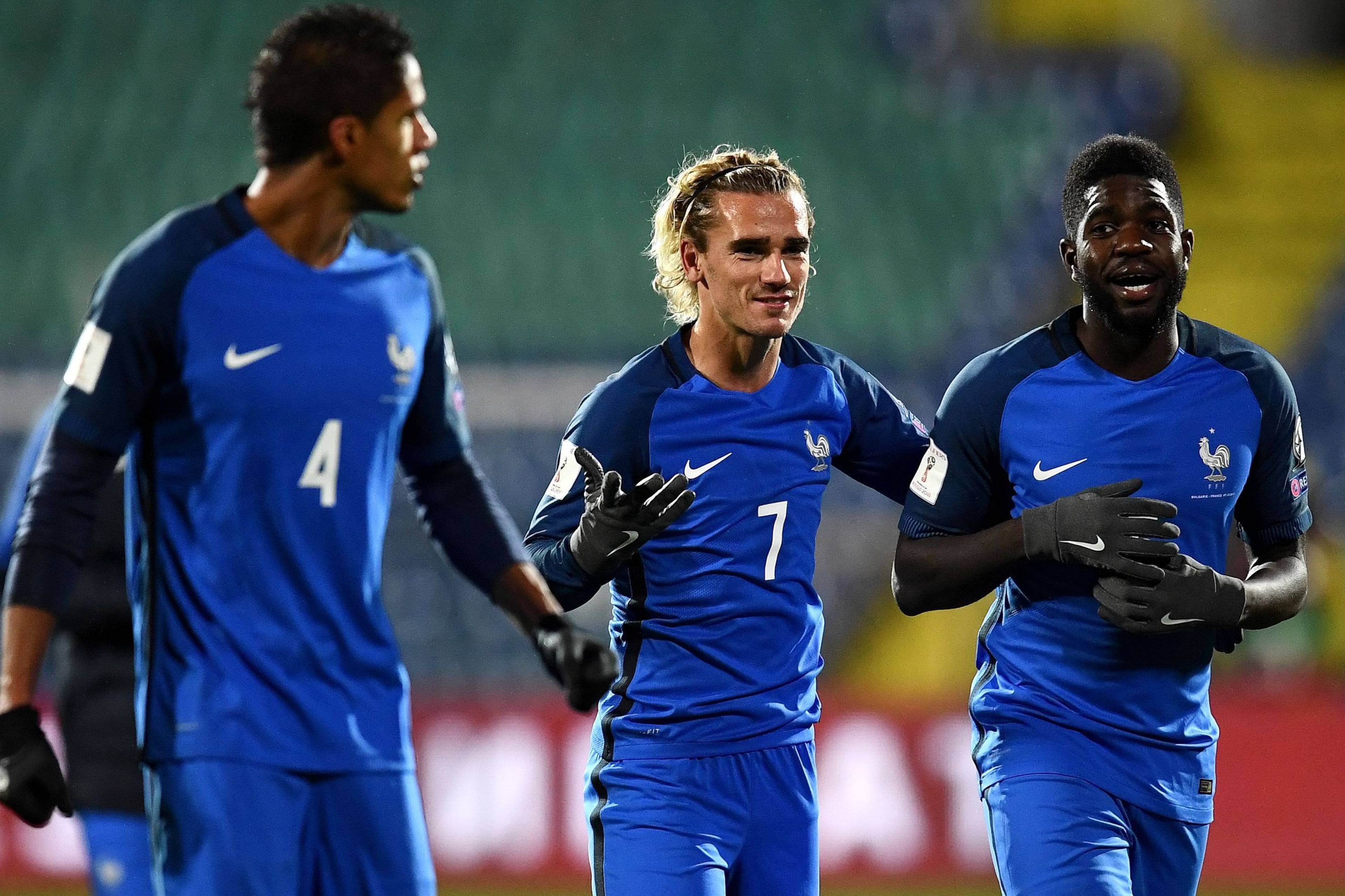 (L/R): France's defender Raphael Varane, France's forward Antoine Griezmann and France's defender Samuel Umtiti celebrate their victory in the FIFA World Cup 2018 qualifying football match between Bulgaria and France at The Vasil Levski Stadium in Sofia o (L/R): France's defender Raphael Varane, France's forward Antoine Griezmann and France's defender Samuel Umtiti celebrate their victory in the FIFA World Cup 2018 qualifying football match between Bulgaria and France at The Vasil Levski Stadium in Sofia o