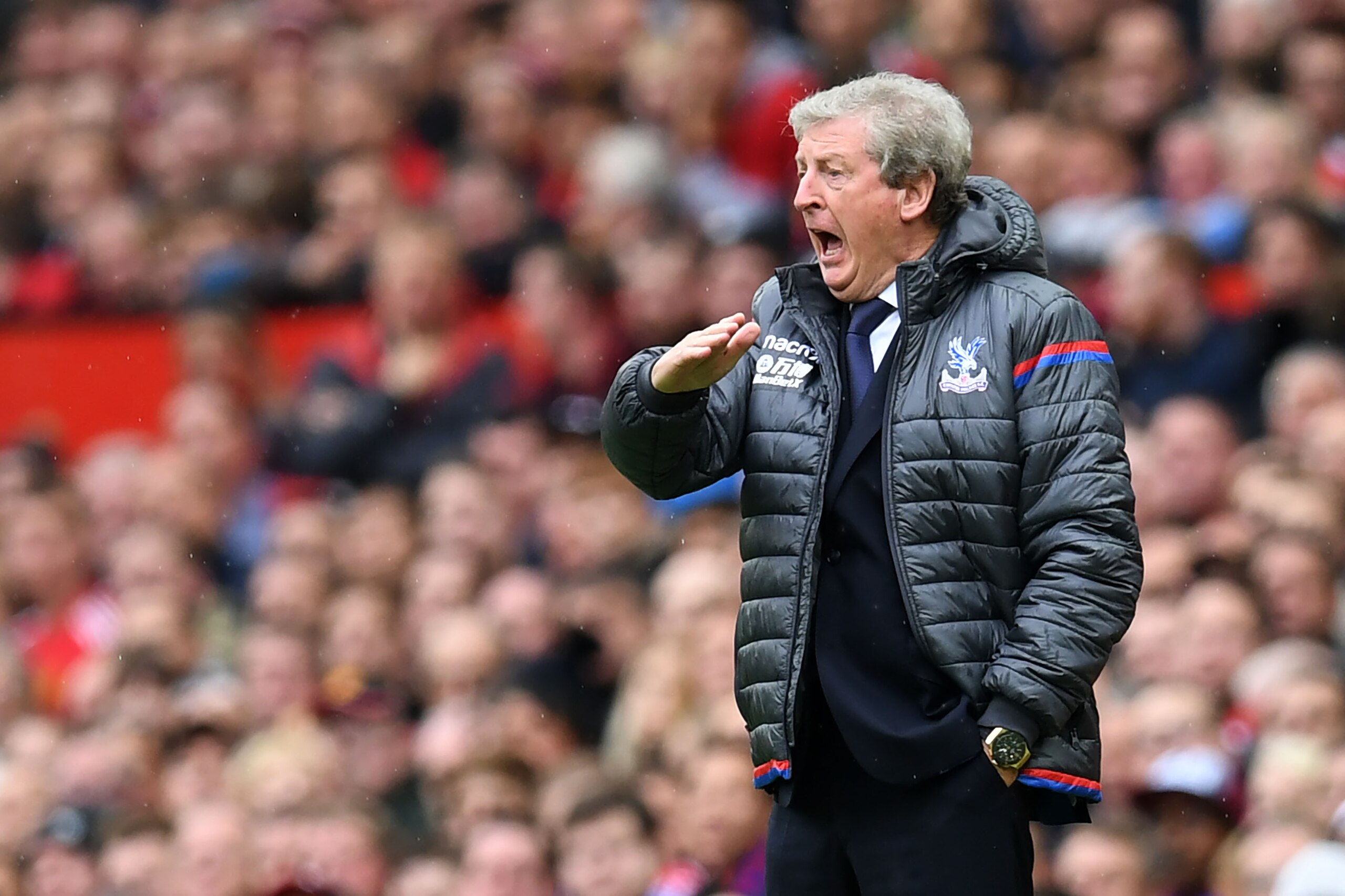 Crystal Palace's English manager Roy Hodgson gestures during the English Premier League football match between Manchester United and Crystal Palace at Old Trafford in Manchester, north west England, on September 30, 2017. / AFP PHOTO / Paul ELLIS / RESTRI Crystal Palace's English manager Roy Hodgson gestures during the English Premier League football match between Manchester United and Crystal Palace at Old Trafford in Manchester, north west England, on September 30, 2017. / AFP PHOTO / Paul ELLIS / RESTRI