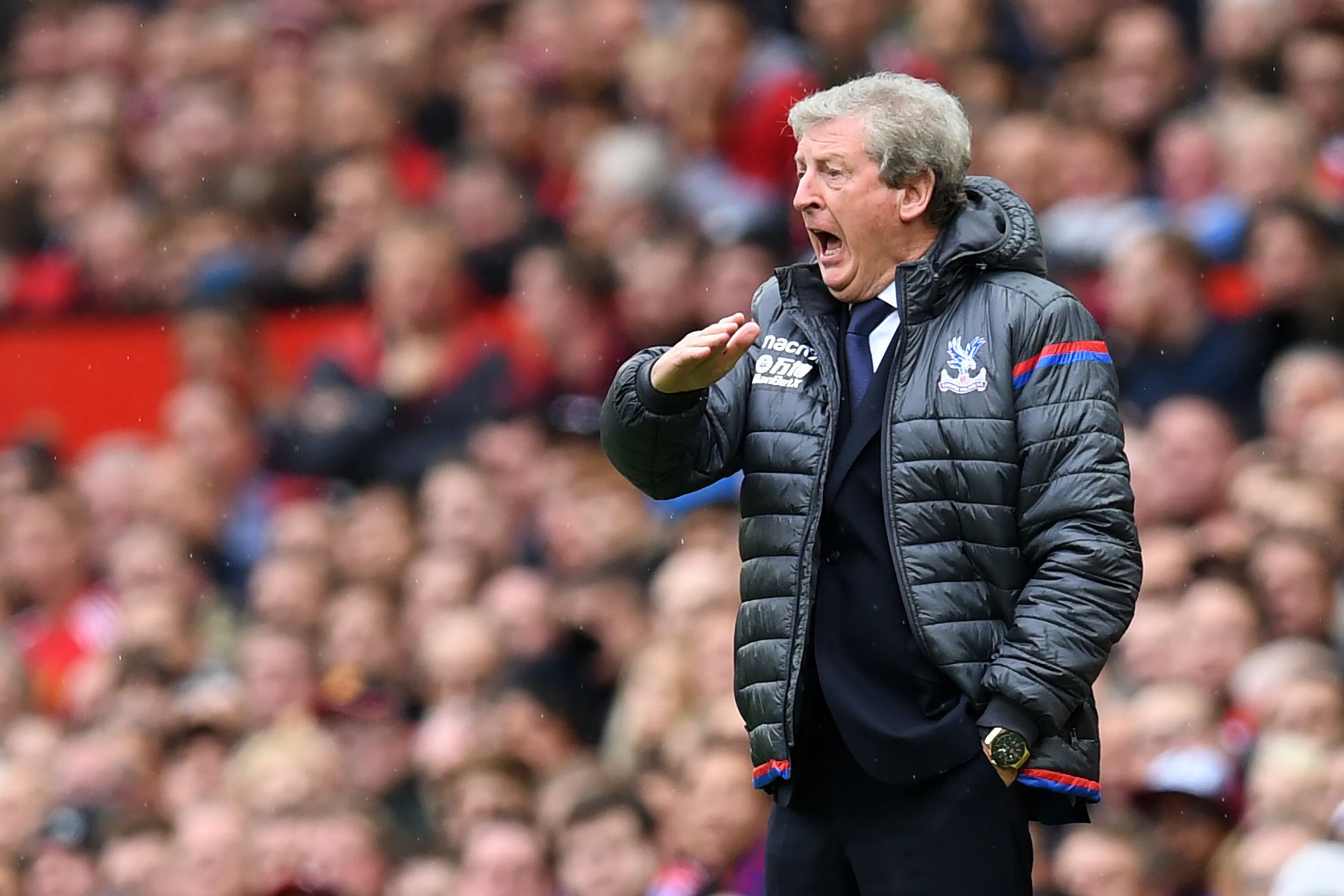 Crystal Palace's English manager Roy Hodgson gestures during the English Premier League football match between Manchester United and Crystal Palace at Old Trafford in Manchester, north west England, on September 30, 2017. / AFP PHOTO / Paul ELLIS / RESTRI
