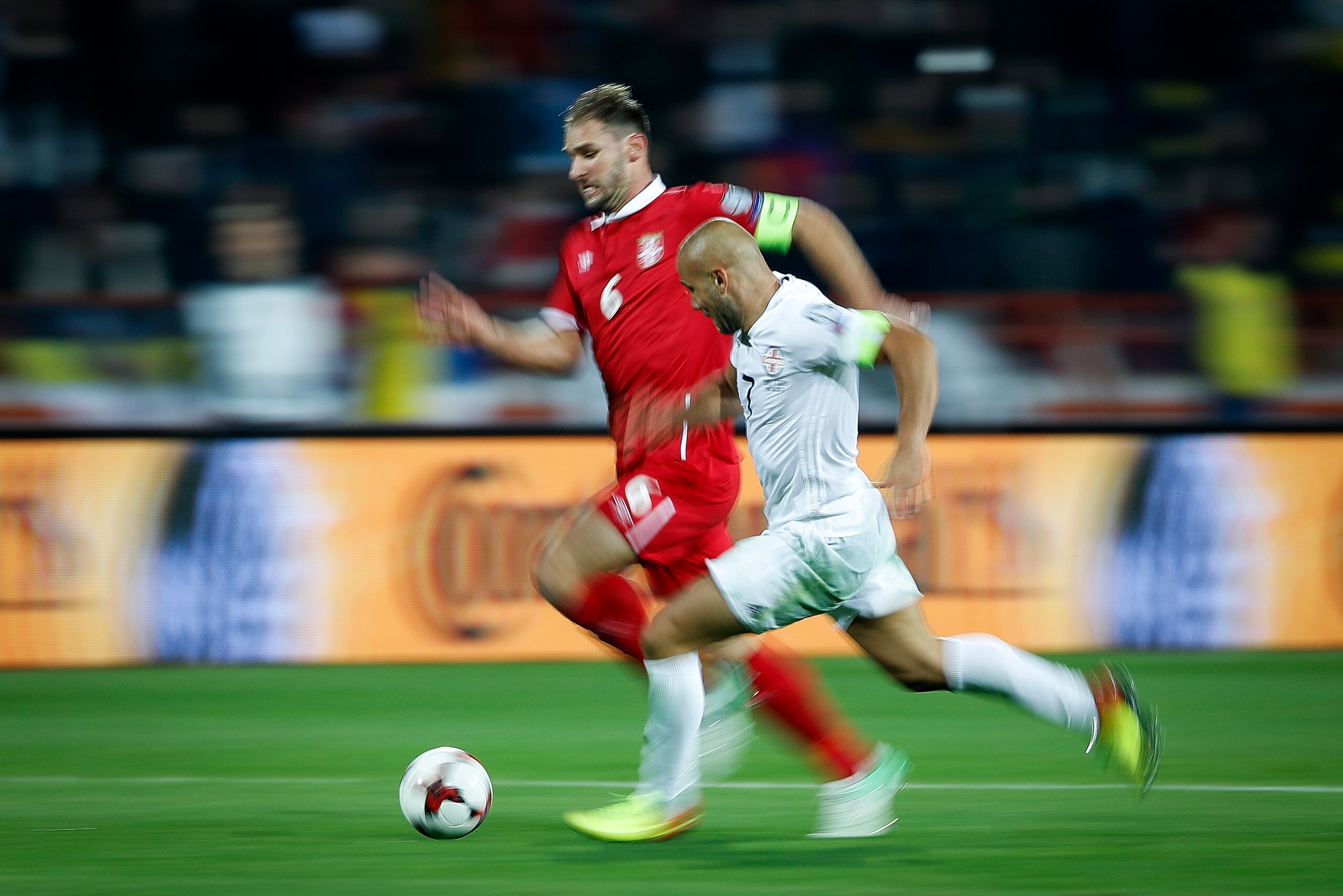 BELGRADE, SERBIA - OCTOBER 09: Branislav Ivanovic (L) of Serbia in action against Jaba Kankava (R) of Georgia during the FIFA 2018 World Cup Qualifier between Serbia and Georgia at stadium Rajko Mitic on October 9, 2017 in Belgrade. (Photo by Srdjan Steva