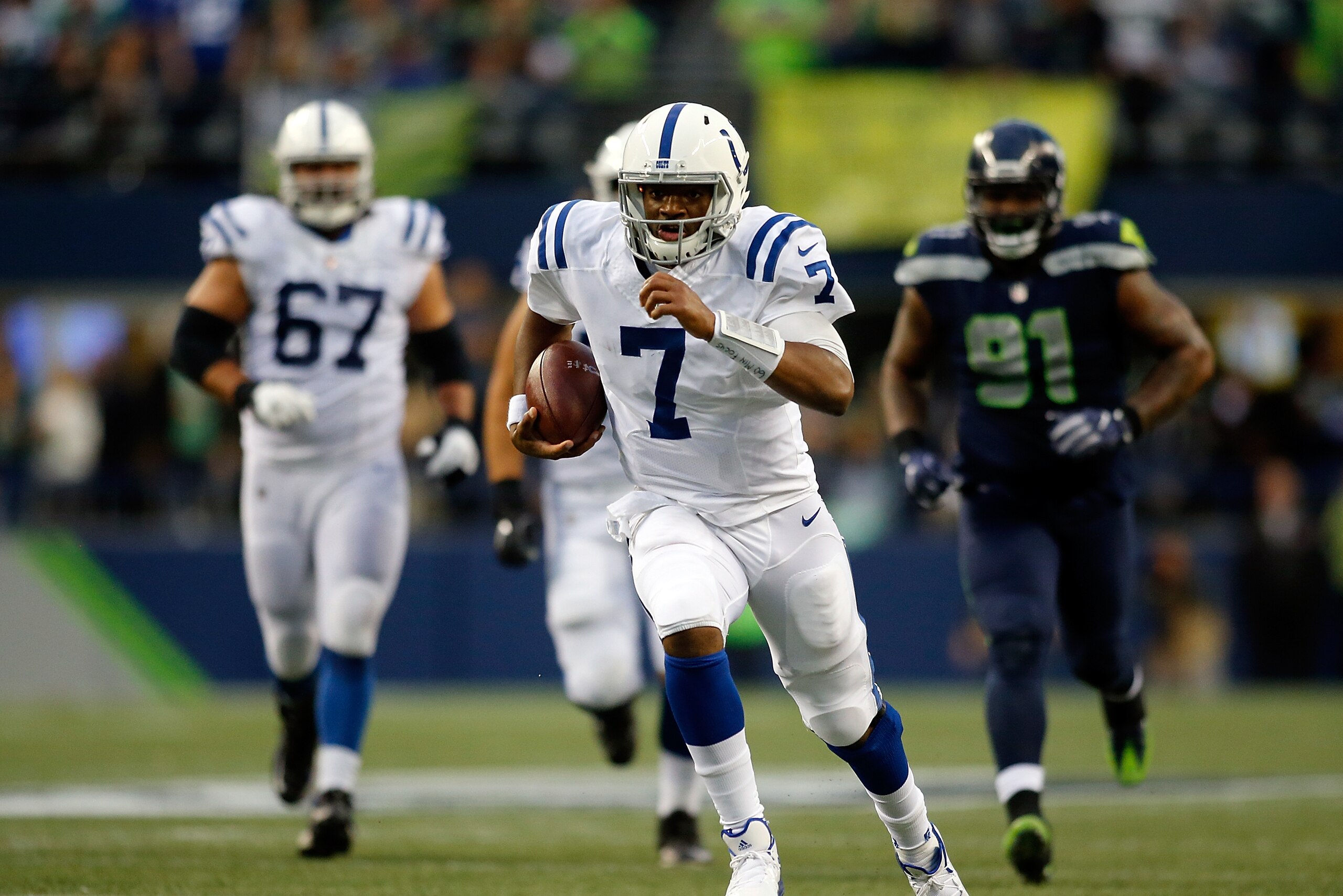 SEATTLE, WA - OCTOBER 01:  Jacoby Brissett #7 of the Indianapolis Colts runs against the Seattle Seahawks at CenturyLink Field on October 1, 2017 in Seattle, Washington.  (Photo by Jonathan Ferrey/Getty Images)