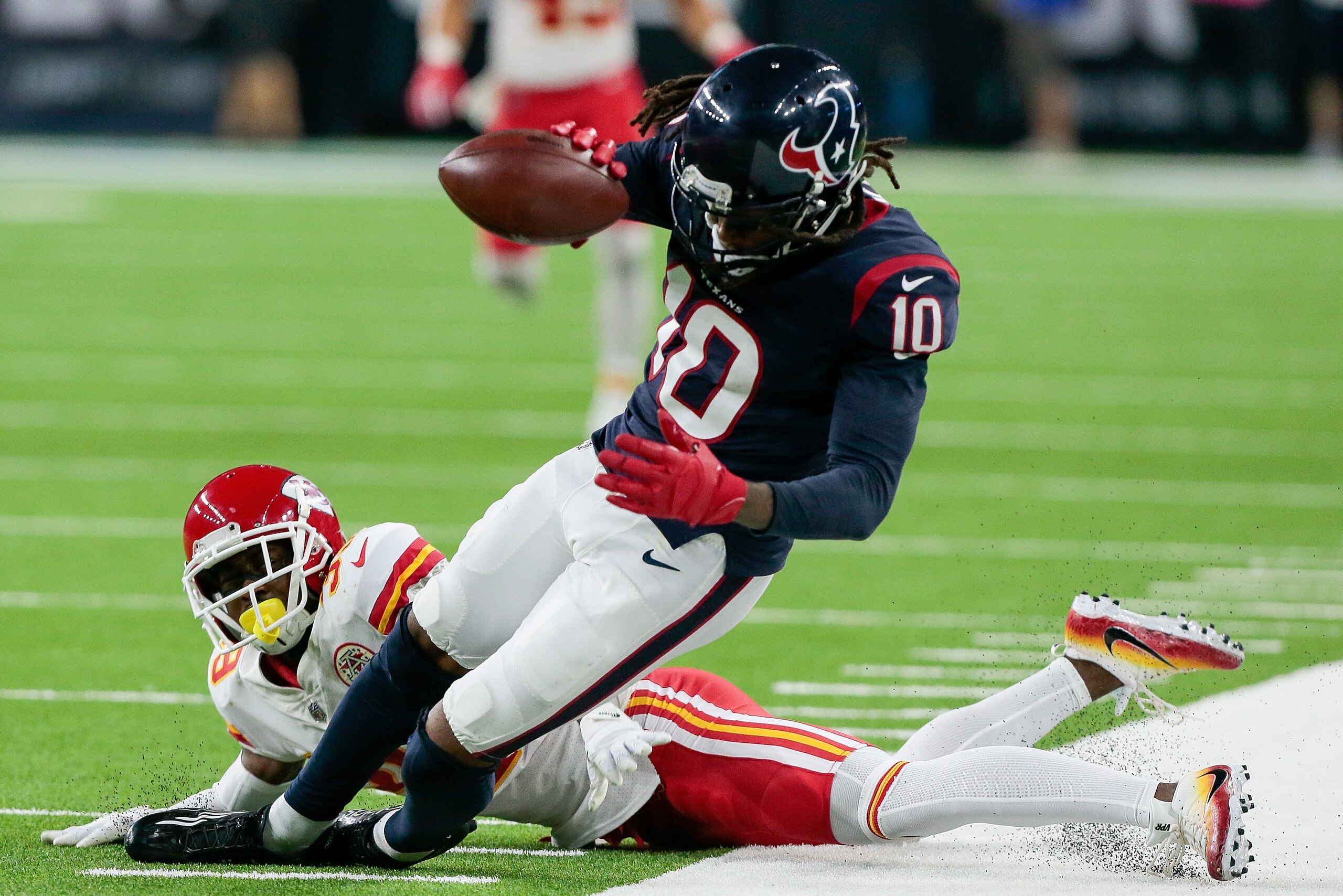 HOUSTON, TX - OCTOBER 08:  DeAndre Hopkins #10 of the Houston Texans makes a catch in the fourth quarter against the Kansas City Chiefs at NRG Stadium on October 8, 2017 in Houston, Texas. The catch was ruled incomplete as Hopkins stepped out of bounds an