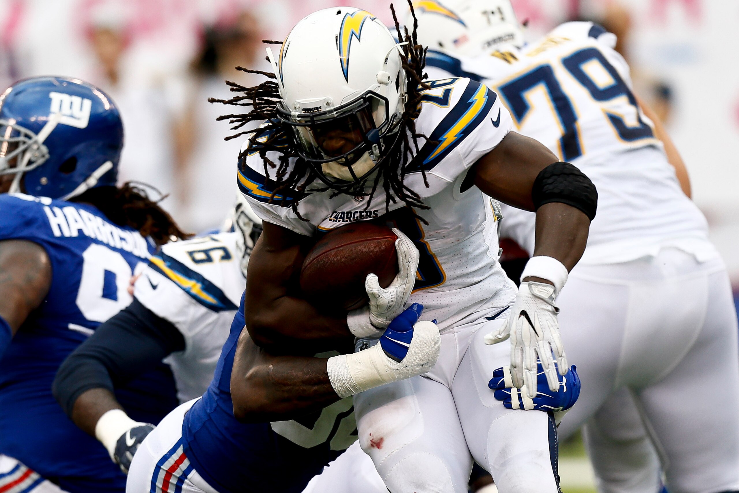 EAST RUTHERFORD, NJ - OCTOBER 08:  Michael Hunter #39 of the New York Giants takes down Melvin Gordon #28 of the Los Angeles Chargers\ during their game at MetLife Stadium on October 8, 2017 in East Rutherford, New Jersey. (Photo by Jeff Zelevansky/Getty 