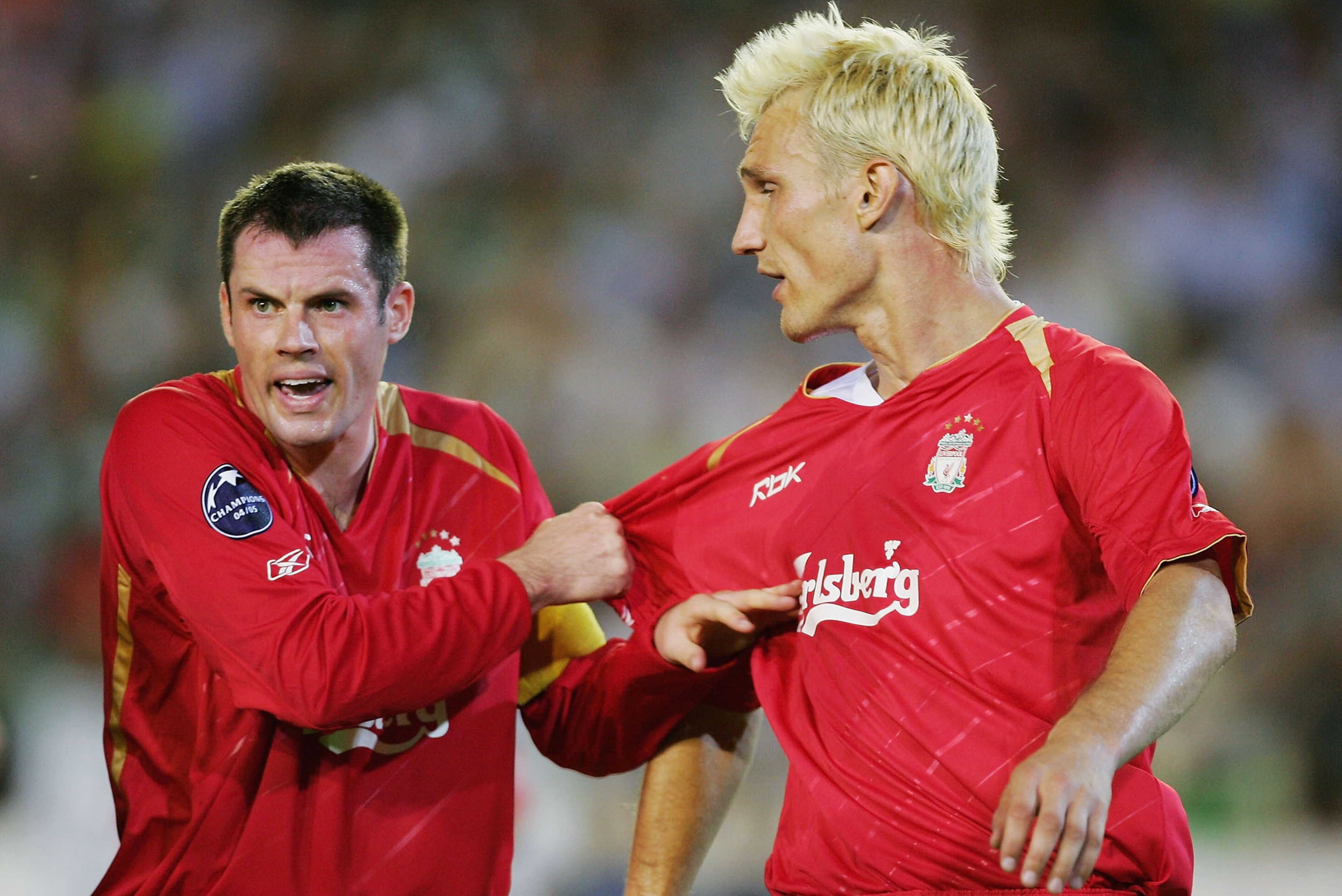 SEVILLE, SPAIN -  SEPTEMBER 13: Liverpool captain Jamie Carragher barks orders to team-mate Sami Hyypia during a second half onslaught by Real Betis during the UEFA Champions League Group G match between Real Betis and Liverpool at the Estadio Ruiz de Lop