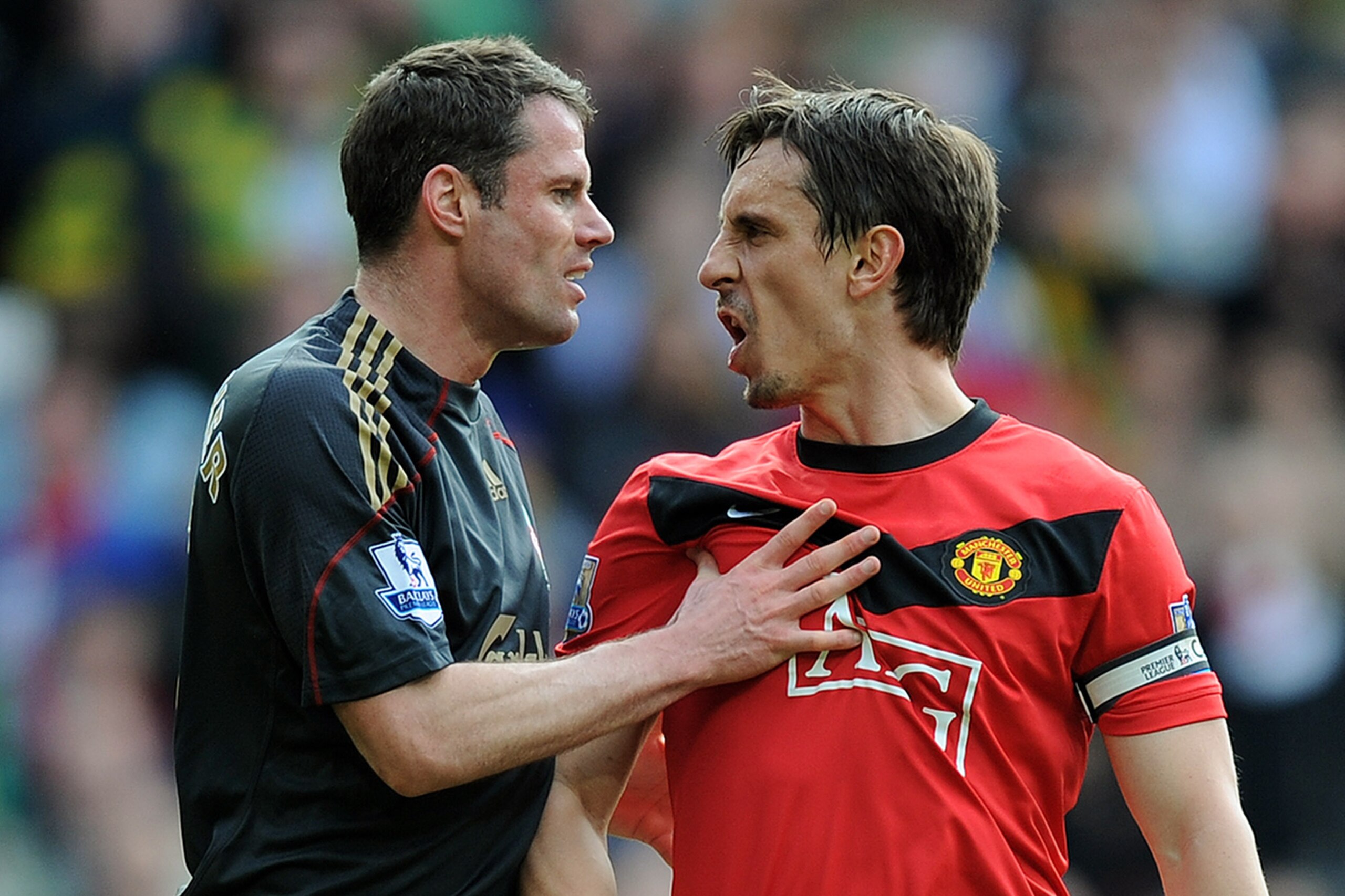 MANCHESTER, ENGLAND - MARCH 21: Jamie Carragher (L) of Liverpool argues with Gary Neville of Manchester United after United were awarded a penalty in the first half of the Barclays Premier League match between Manchester United and Liverpool at Old Traffo MANCHESTER, ENGLAND - MARCH 21: Jamie Carragher (L) of Liverpool argues with Gary Neville of Manchester United after United were awarded a penalty in the first half of the Barclays Premier League match between Manchester United and Liverpool at Old Traffo