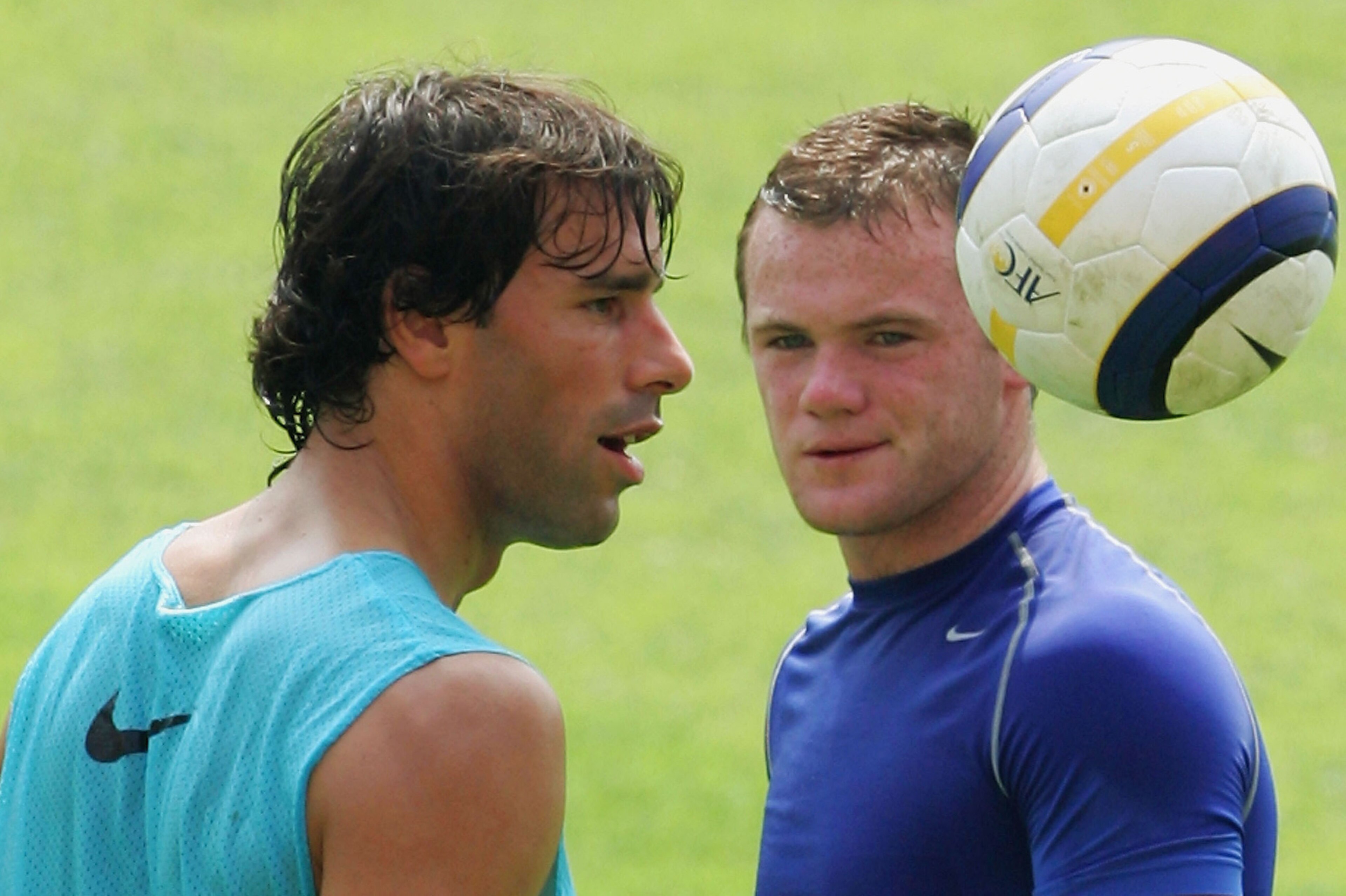 BEIJING, CHINA - JULY 25:  Ruud van Nistelrooy (L) and Wayne Rooney of Manchester United take part in a  a pre-match training session on July 25, 2005 in Beijing, China. Manchester United are in China's capital to play the Beijing Hyundai team on July 26 