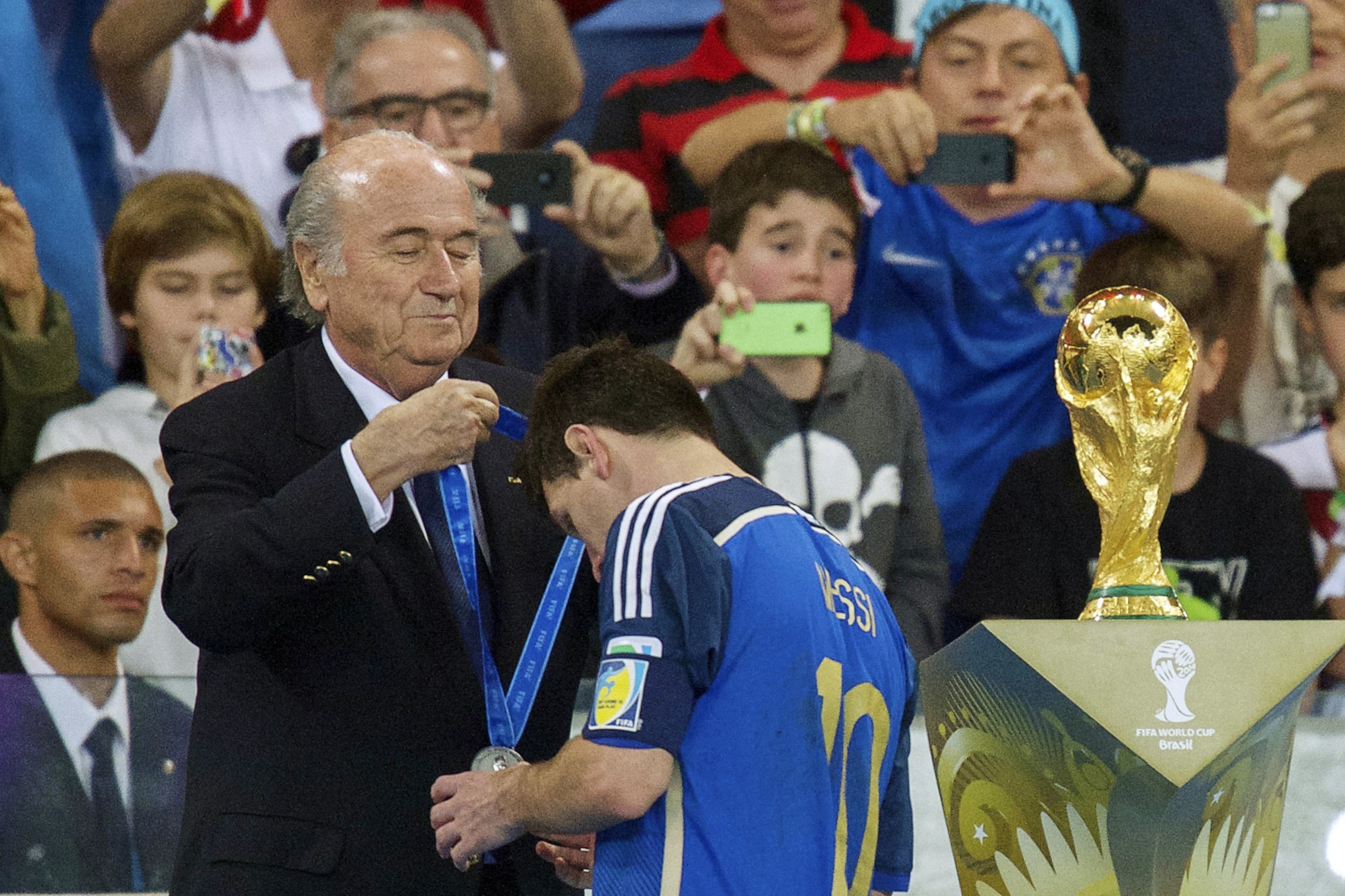 (L-R) President Sepp Blatter of FIFA, Lionel Messi of Argentina during the final of the FIFA World Cup 2014 on July 13, 2014 at the Maracana stadium in Rio de Janeiro, Brazil.(Photo by VI Images via Getty Images)