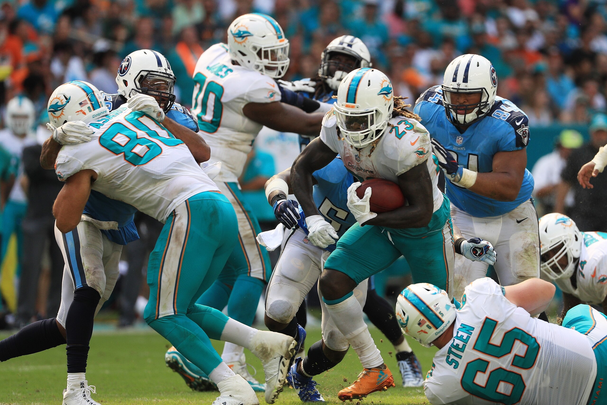 MIAMI GARDENS, FL - OCTOBER 08:   Jay Ajayi #23 of the Miami Dolphins carries the ball against the Tennessee Titans in the third quarter on October 8, 2017 at Hard Rock Stadium in Miami Gardens, Florida.  (Photo by Mike Ehrmann/Getty Images)
