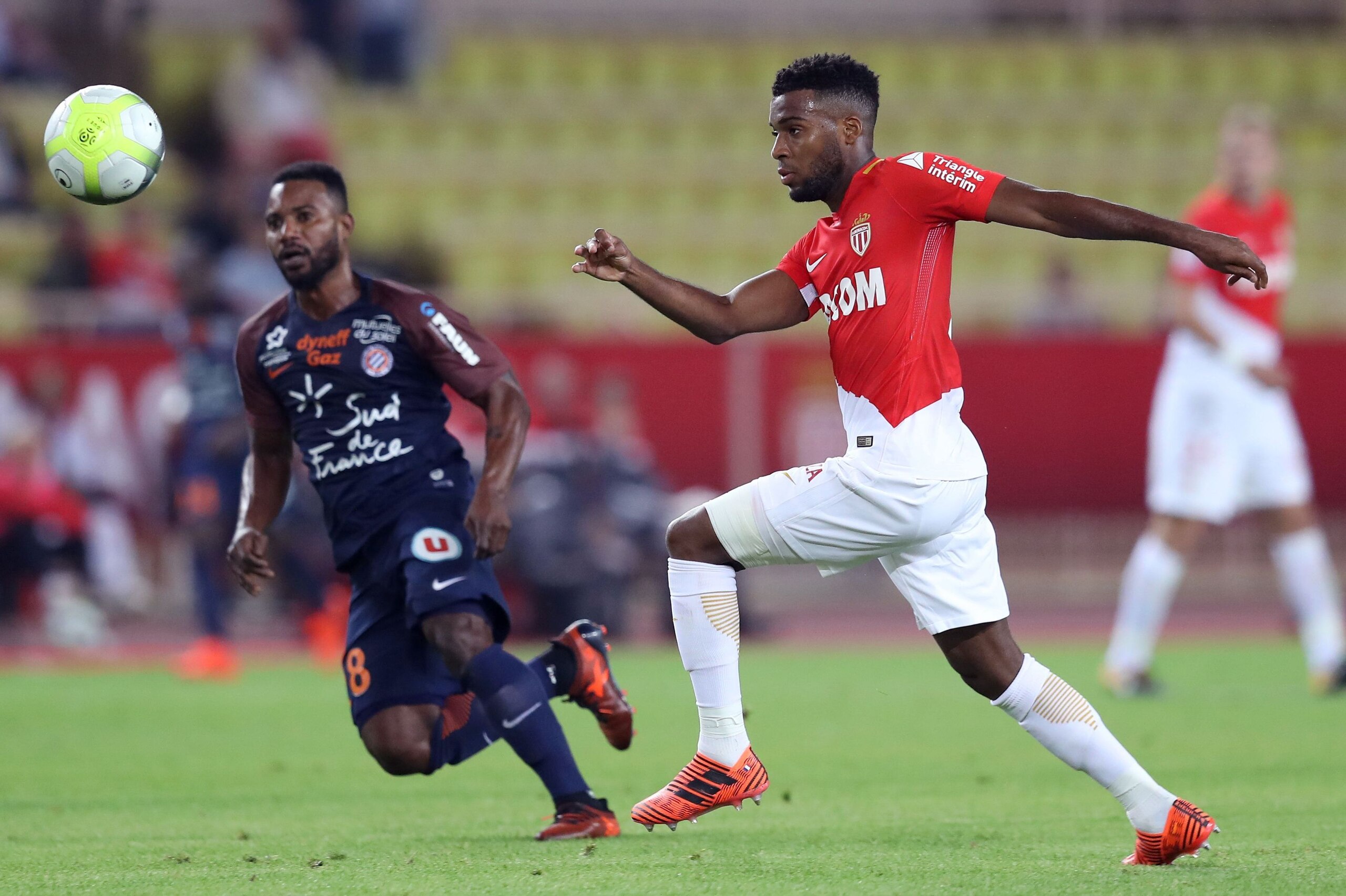 Monaco's French midfielder Thomas Lemar (R) vies with Montpellier's French midfielder Stephane Sessegnon (L) during the French L1 football match Monaco vs Montpellier on september 29, 2017 at the 'Louis II' Stadium in Monaco. / AFP PHOTO / VALERY HACHE Monaco's French midfielder Thomas Lemar (R) vies with Montpellier's French midfielder Stephane Sessegnon (L) during the French L1 football match Monaco vs Montpellier on september 29, 2017 at the 'Louis II' Stadium in Monaco. / AFP PHOTO / VALERY HACHE