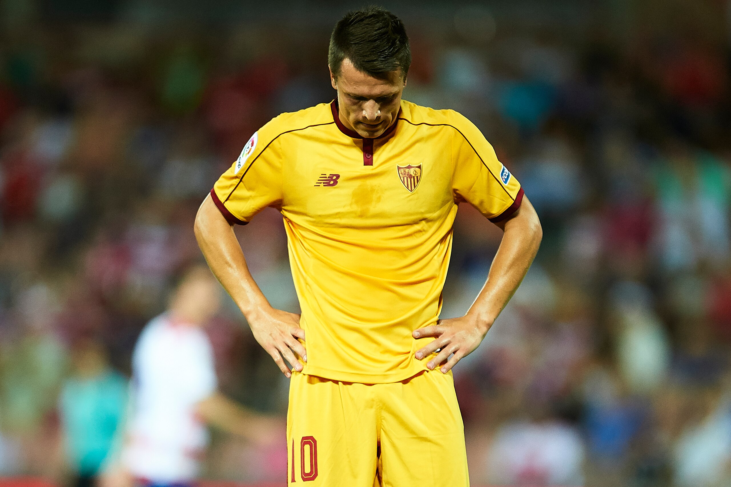 GRANADA, SPAIN - AUGUST 02:  Yevhen Konoplyanka of Sevilla FC reacts during a friendly match between Granada FC and Sevilla FC at Estadio Nuevo los Carmenes on August 2, 2016 in Granada, Spain.  (Photo by Aitor Alcalde/Getty Images)