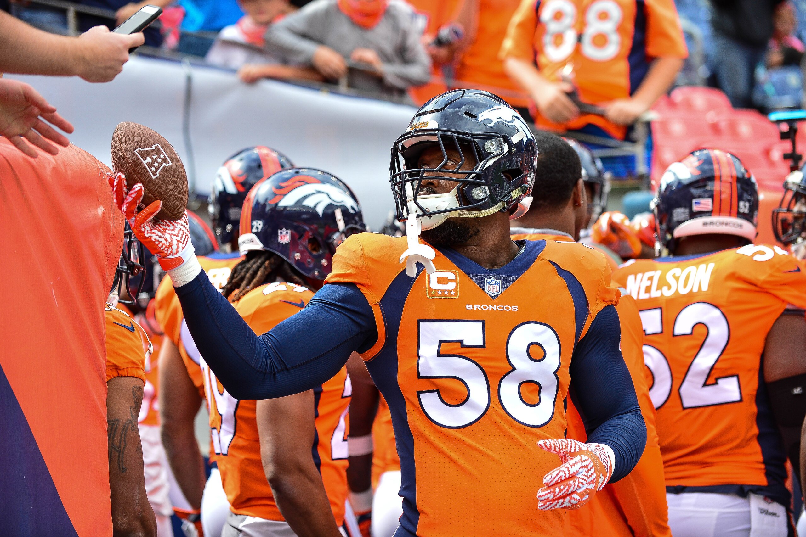 DENVER, CO - OCTOBER 1:  Outside linebacker Von Miller #58 of the Denver Broncos interacts with fans before a game against the Oakland Raiders at Sports Authority Field at Mile High on October 1, 2017 in Denver, Colorado. (Photo by Dustin Bradford/Getty I