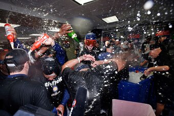 Cubs celebrating a dramatic Game 5 victory