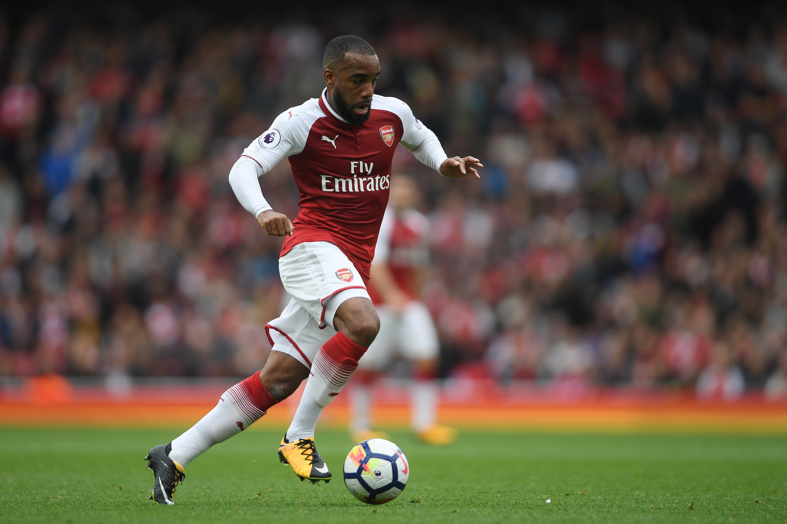 LONDON, ENGLAND - OCTOBER 01:  Alexandre Lacazette of Arsenal in action during the Premier League match between Arsenal and Brighton and Hove Albion at Emirates Stadium on October 1, 2017 in London, England.  (Photo by Mike Hewitt/Getty Images)