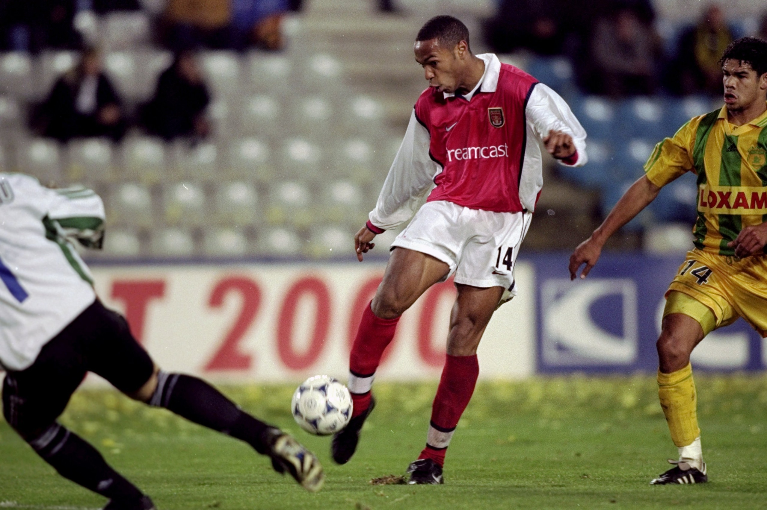 9 Dec 1999:  Thierry Henry of Arsenal scores against Nantes during the UEFA Cup third round match at the Beaujoire Stadium in Nantes, France. The game ended 3-3 and Arsenal went through 6-3 on aggregate. \ Mandatory Credit: Gary Prior /Allsport