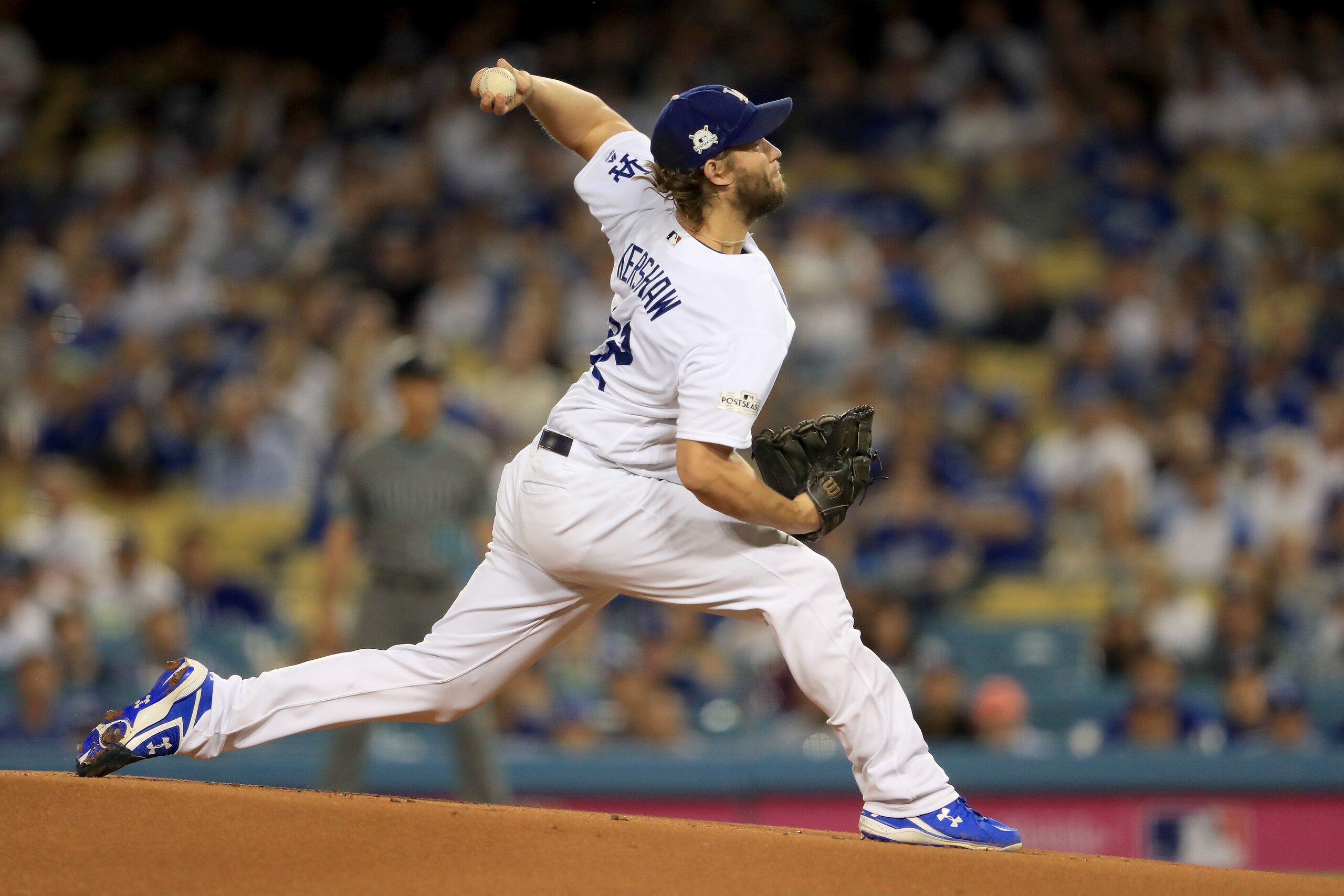 LOS ANGELES, CA - OCTOBER 06:  Clayton Kershaw #22 of the Los Angeles Dodgers pitches in the first inning against the Arizona Diamondbacks in game one of the National League Division Series at Dodger Stadium on October 6, 2017 in Los Angeles, California. 