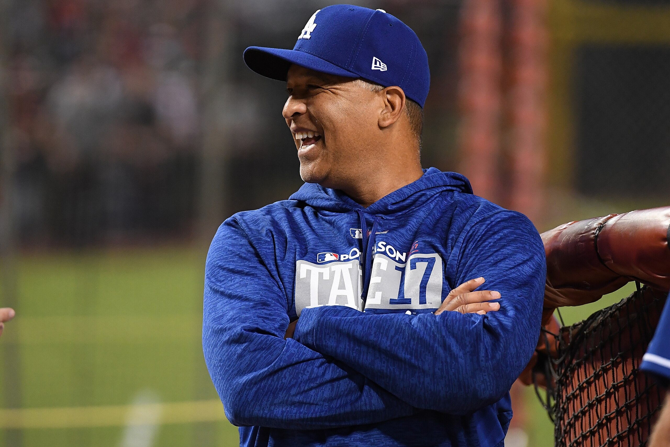 PHOENIX, AZ - OCTOBER 09:  Manager Dave Roberts #30 of the Los Angeles Dodgers prepares for game three of the National League Divisional Series against the Arizona Diamondbacks at Chase Field on October 9, 2017 in Phoenix, Arizona.  (Photo by Norm Hall/Ge