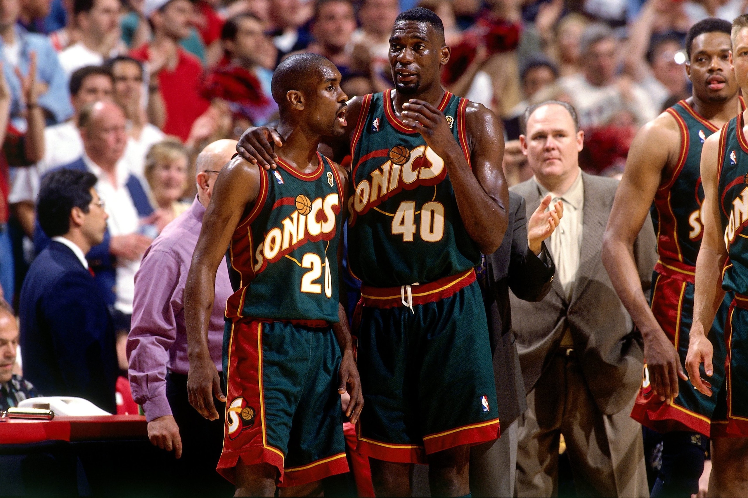 CHICAGO - JUNE 16: Shawn Kemp #40 and Gary Payton #20 of the Seattle SuperSonics discuss strategy during Game Six of the 1996 NBA Finals against the Chicago Bulls at the United Center on June 16, 1996 in Chicago Iillinois. The Bulls won 87-75. NOTE TO U CHICAGO - JUNE 16: Shawn Kemp #40 and Gary Payton #20 of the Seattle SuperSonics discuss strategy during Game Six of the 1996 NBA Finals against the Chicago Bulls at the United Center on June 16, 1996 in Chicago Iillinois. The Bulls won 87-75. NOTE TO U