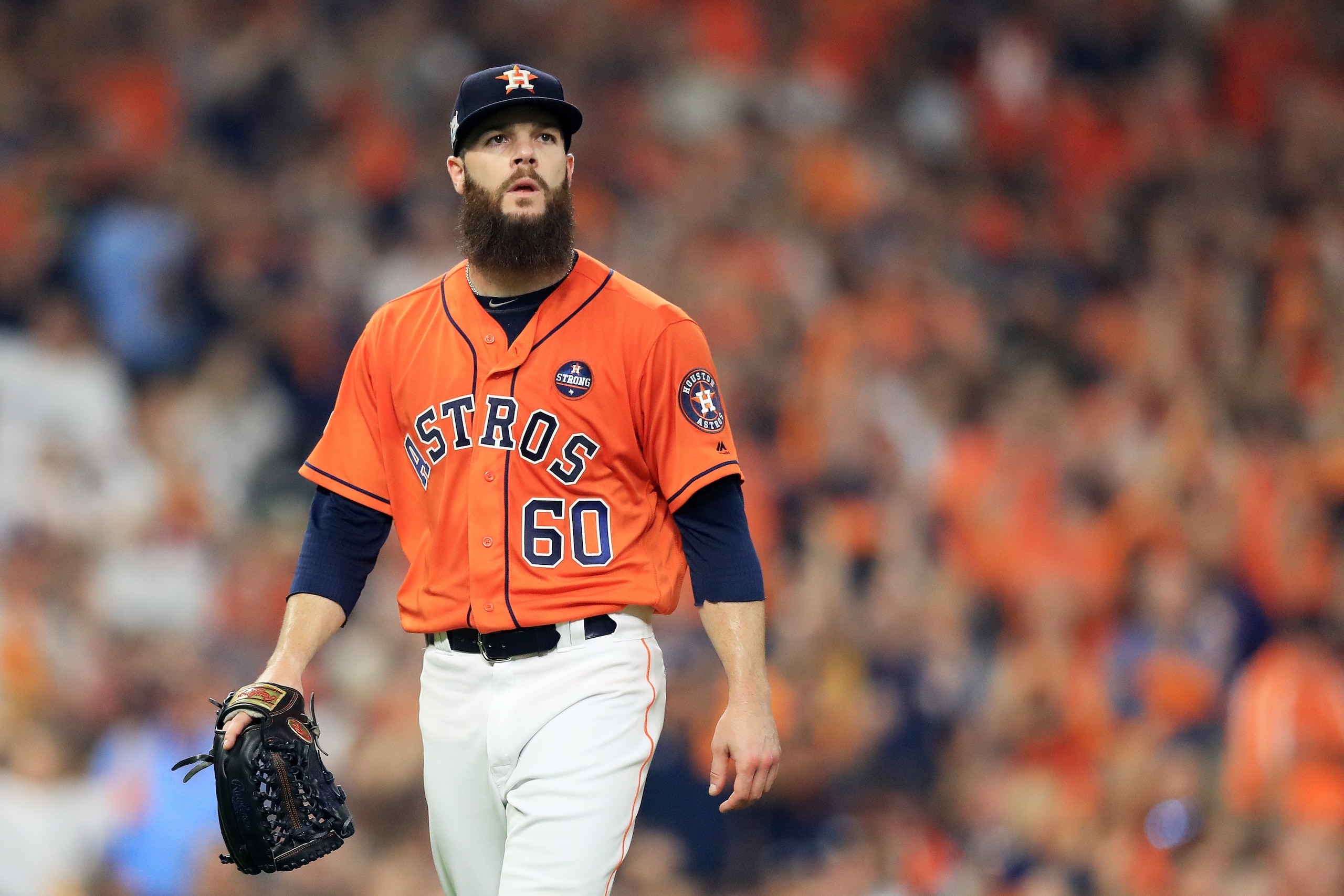 HOUSTON, TX - OCTOBER 13:  Dallas Keuchel #60 of the Houston Astros reacts after striking out the third batter in the second inning during game one of the American League Championship Series at Minute Maid Park on October 13, 2017 in Houston, Texas.  (Pho