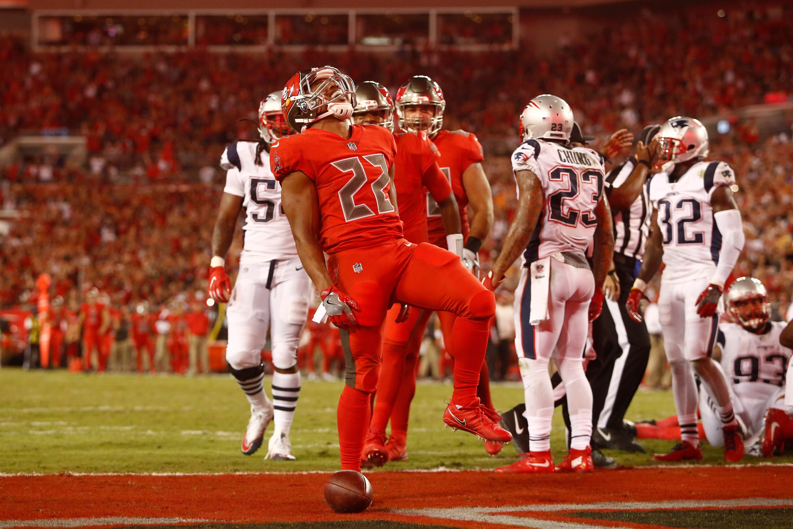TAMPA, FL - OCTOBER 5:  Running back Doug Martin #22 of the Tampa Bay Buccaneers celebrates in the end zone following a 1-yard rush for a touchdown during the second quarter of an NFL football game against the New England Patriots on October 5, 2017 at Ra