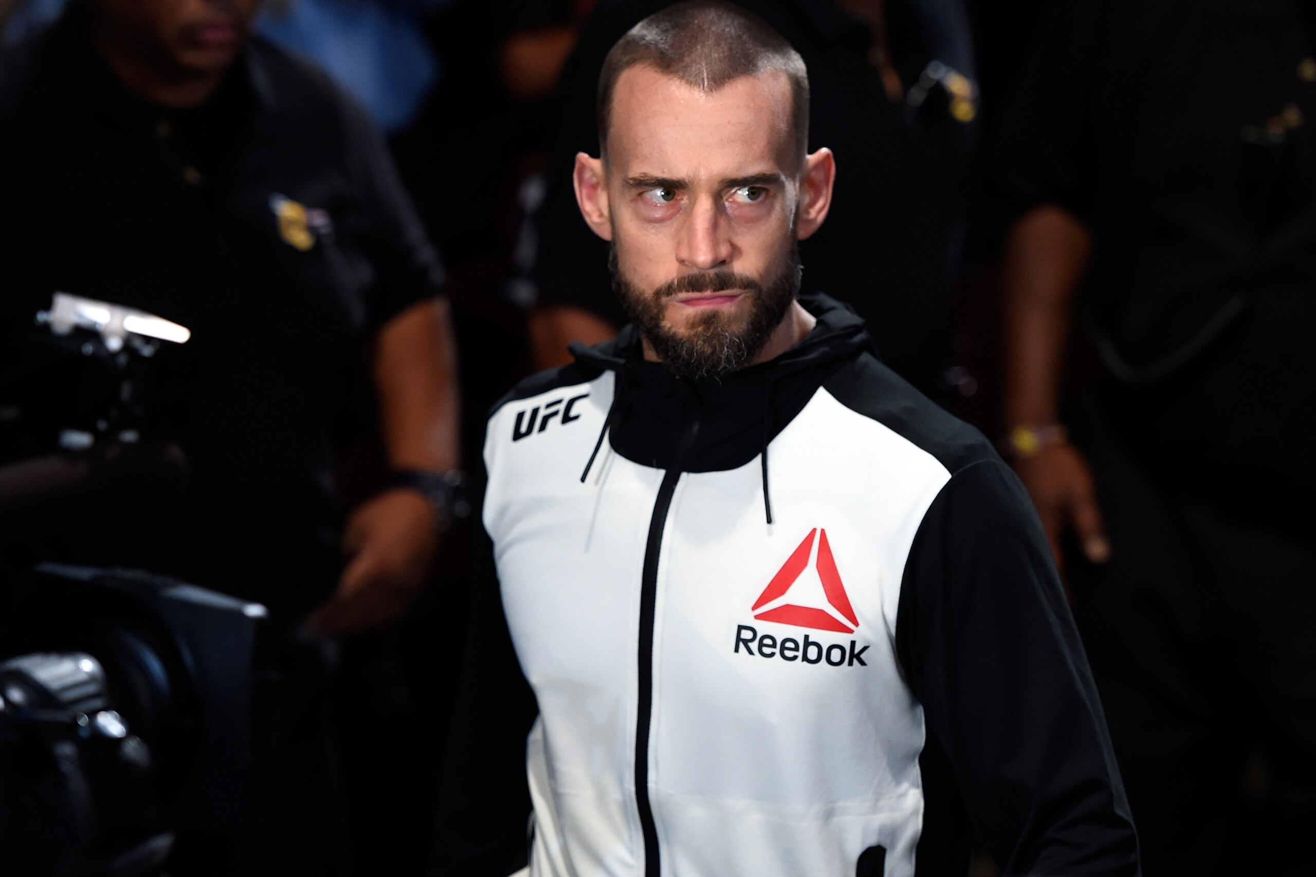 CLEVELAND, OH - SEPTEMBER 10:  Phil 'CM Punk' Brooks enters the arena prior to facing Mickey Gall in their welterweight bout during the UFC 203 event at Quicken Loans Arena on September 10, 2016 in Cleveland, Ohio. (Photo by Josh Hedges/Zuffa LLC/Zuffa LL