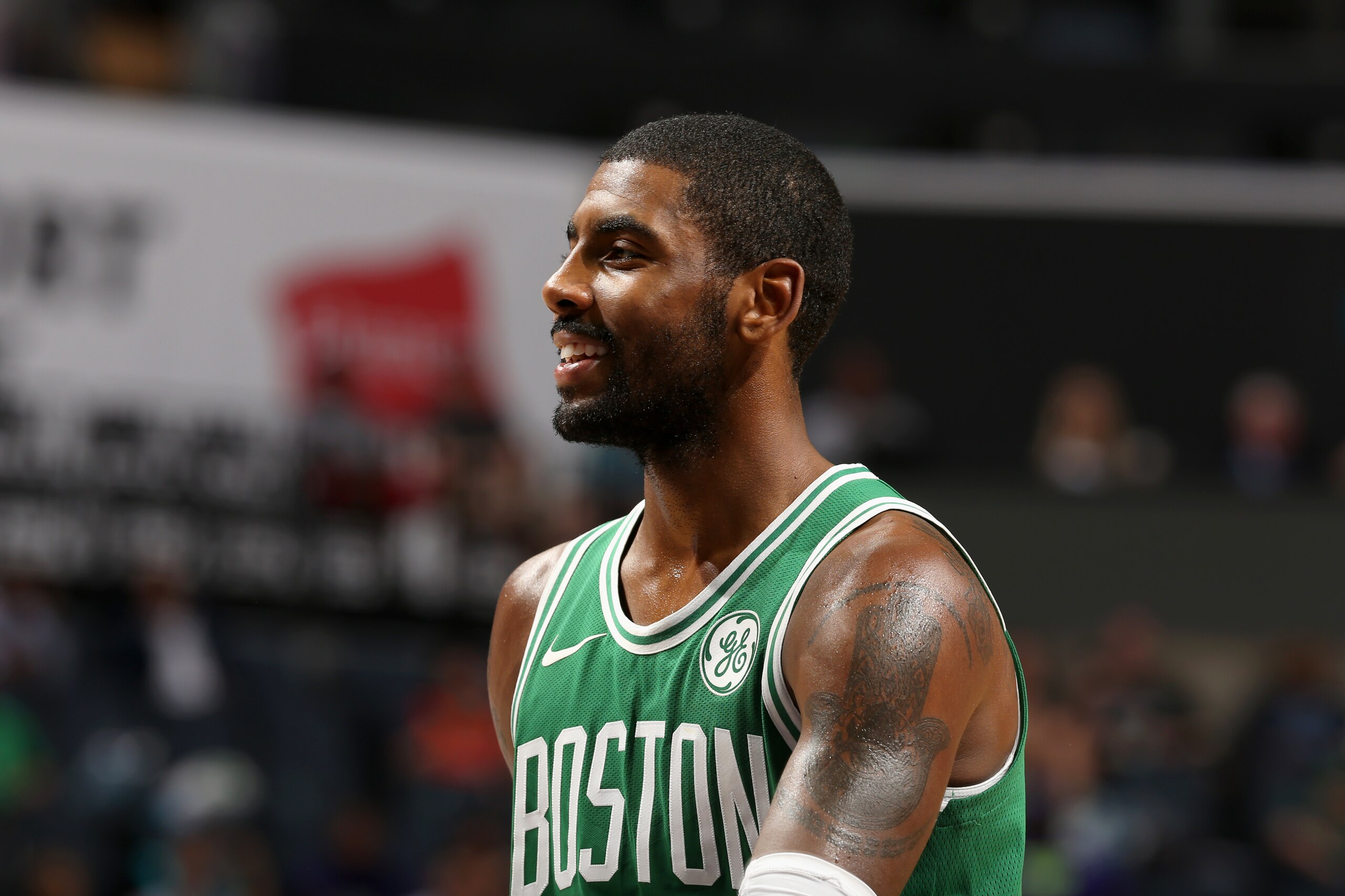 CHARLOTTE, NC - OCTOBER 11:  Kyrie Irving #11 of the Boston Celtics looks on during the game against the Charlotte Hornets on October 11, 2017 at Spectrum Center in Charlotte, North Carolina. NOTE TO USER: User expressly acknowledges and agrees that, by d