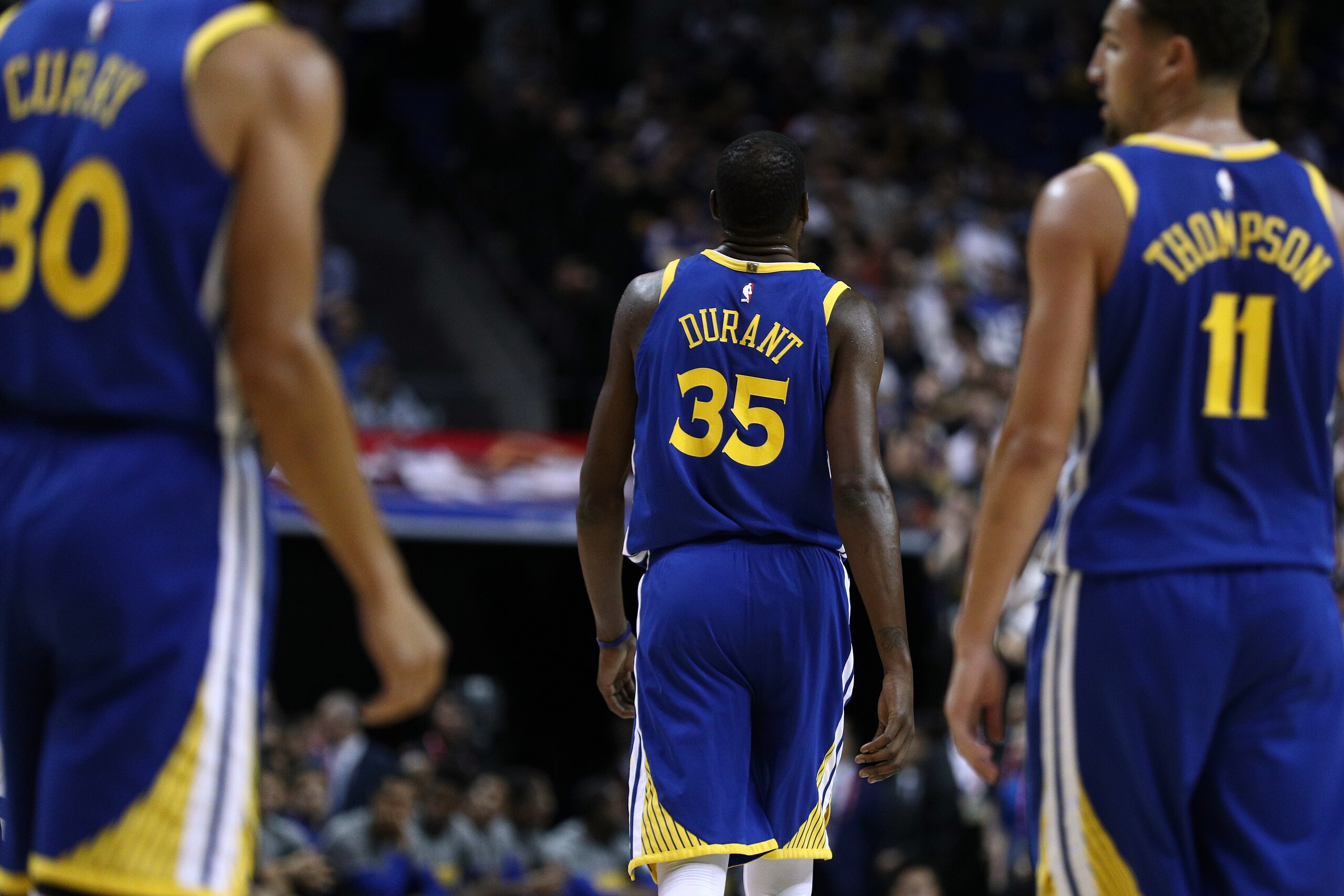 SHANGHAI, CHINA - OCTOBER 08: Kevin Durant #35, Stephen Curry #30, Klay Thompson #11 of the Golden State Warriors during the game between the Minnesota Timberwolves and the Golden State Warriors as part of 2017 NBA Global Games China at Mercedes-Benz Aren