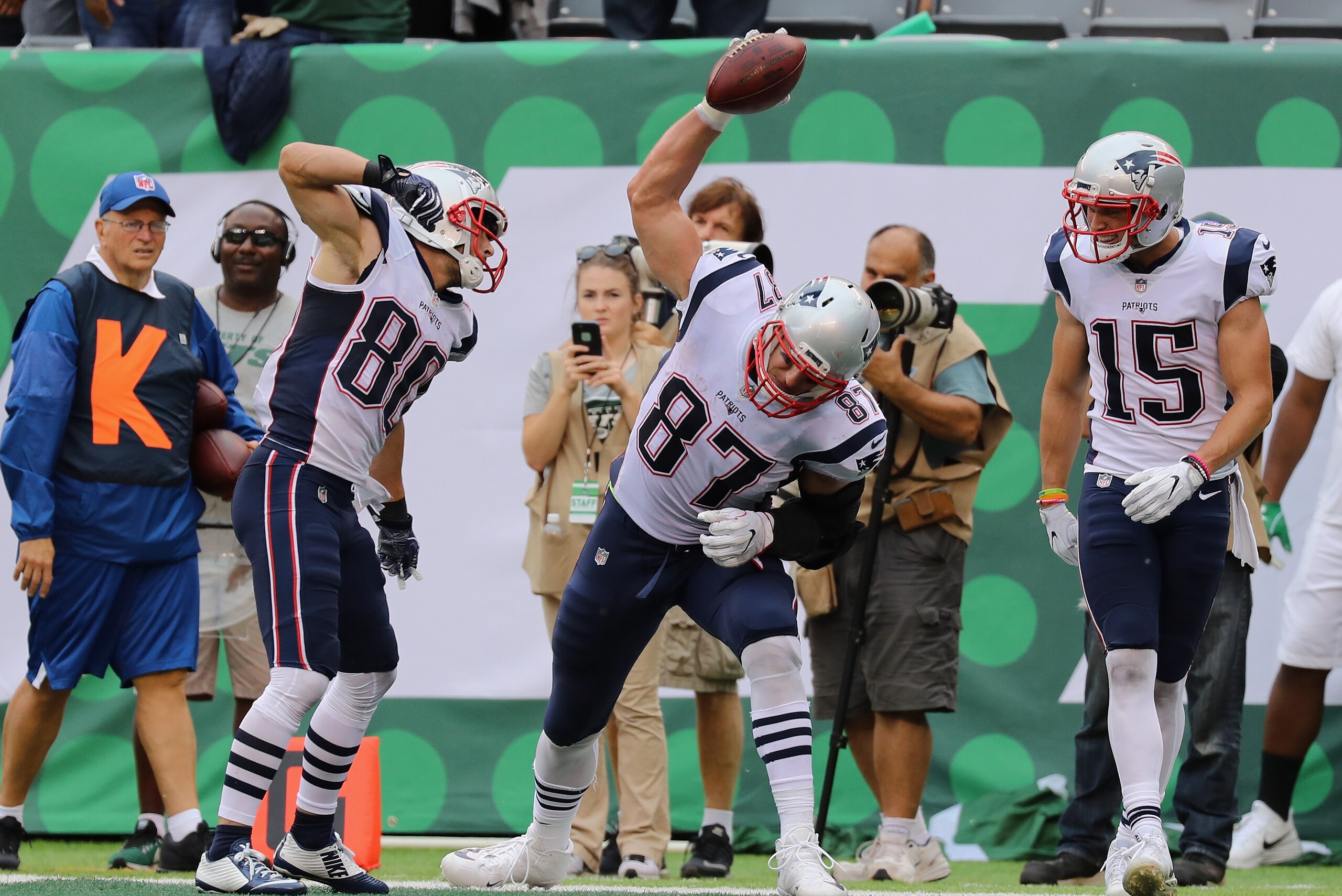 EAST RUTHERFORD, NJ - OCTOBER 15:  Tight end Rob Gronkowski #87 of the New England Patriots celebrates  with teammates wide receiver Danny Amendola #80 and wide receiver Chris Hogan #15 during the second quarter of their game against the New York Jets at 