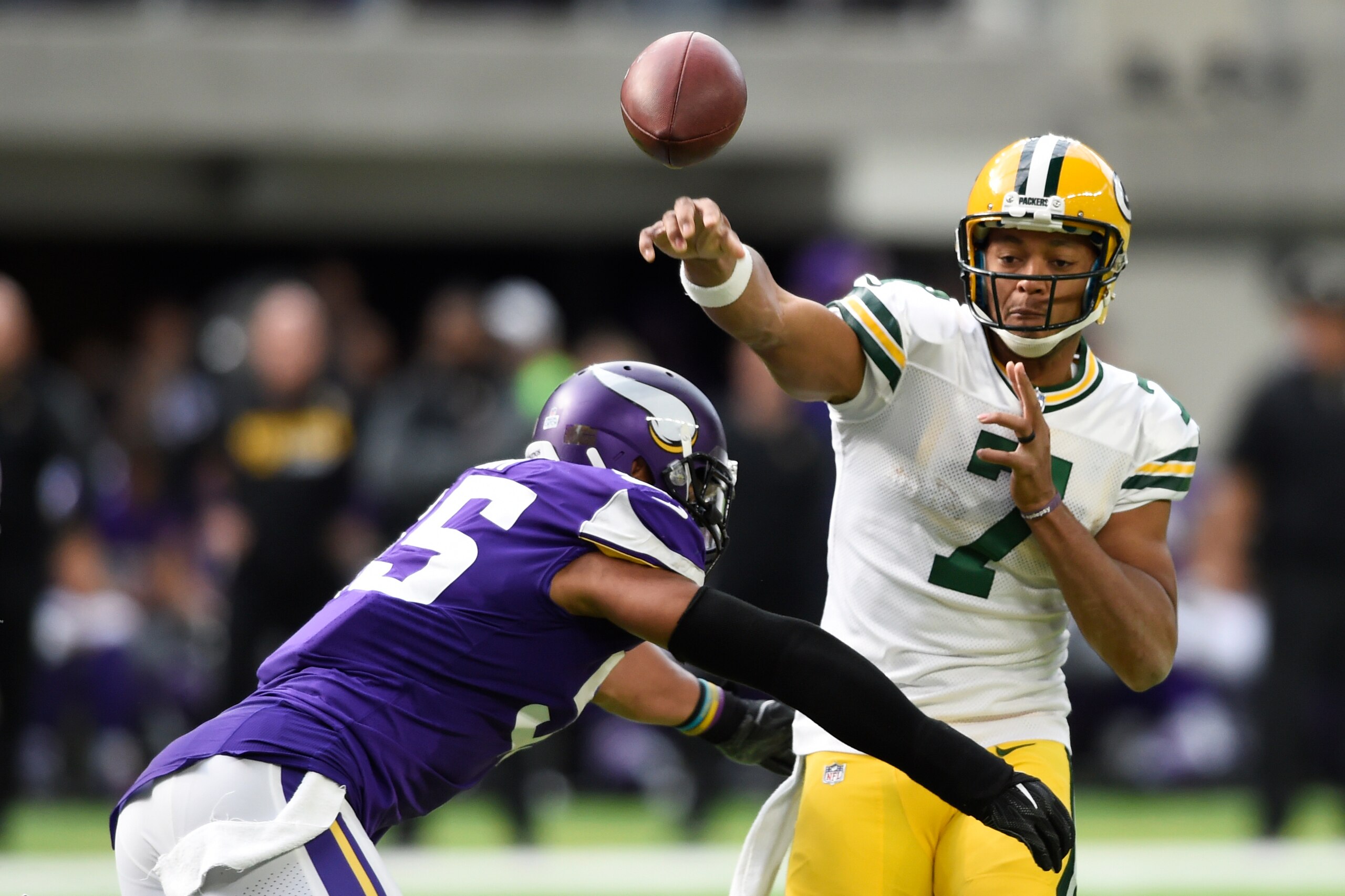 MINNEAPOLIS, MN - OCTOBER 15: Brett Hundley #7 of the Green Bay Packers throws the ball before being hit by Anthony Barr #55 of the Minnesota Vikings during the second quarter of the game on October 15, 2017 at US Bank Stadium in Minneapolis, Minnesota. ( MINNEAPOLIS, MN - OCTOBER 15: Brett Hundley #7 of the Green Bay Packers throws the ball before being hit by Anthony Barr #55 of the Minnesota Vikings during the second quarter of the game on October 15, 2017 at US Bank Stadium in Minneapolis, Minnesota. (