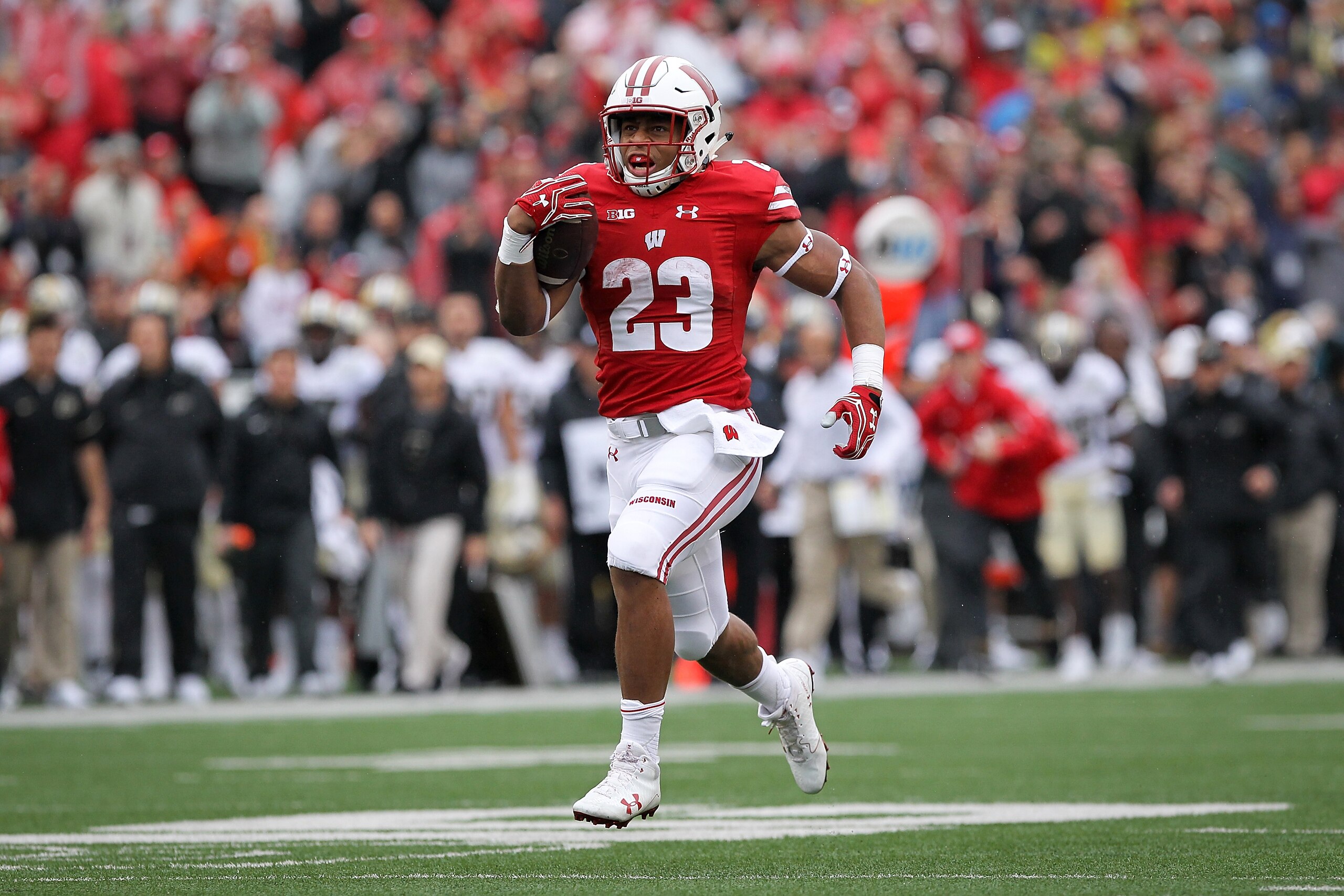 MADISON, WI - OCTOBER 14:  Jonathan Taylor #23 of the Wisconsin Badgers runs with the ball in the first quarter against the Purdue Boilermakers at Camp Randall Stadium on October 14, 2017 in Madison, Wisconsin.  (Photo by Dylan Buell/Getty Images)