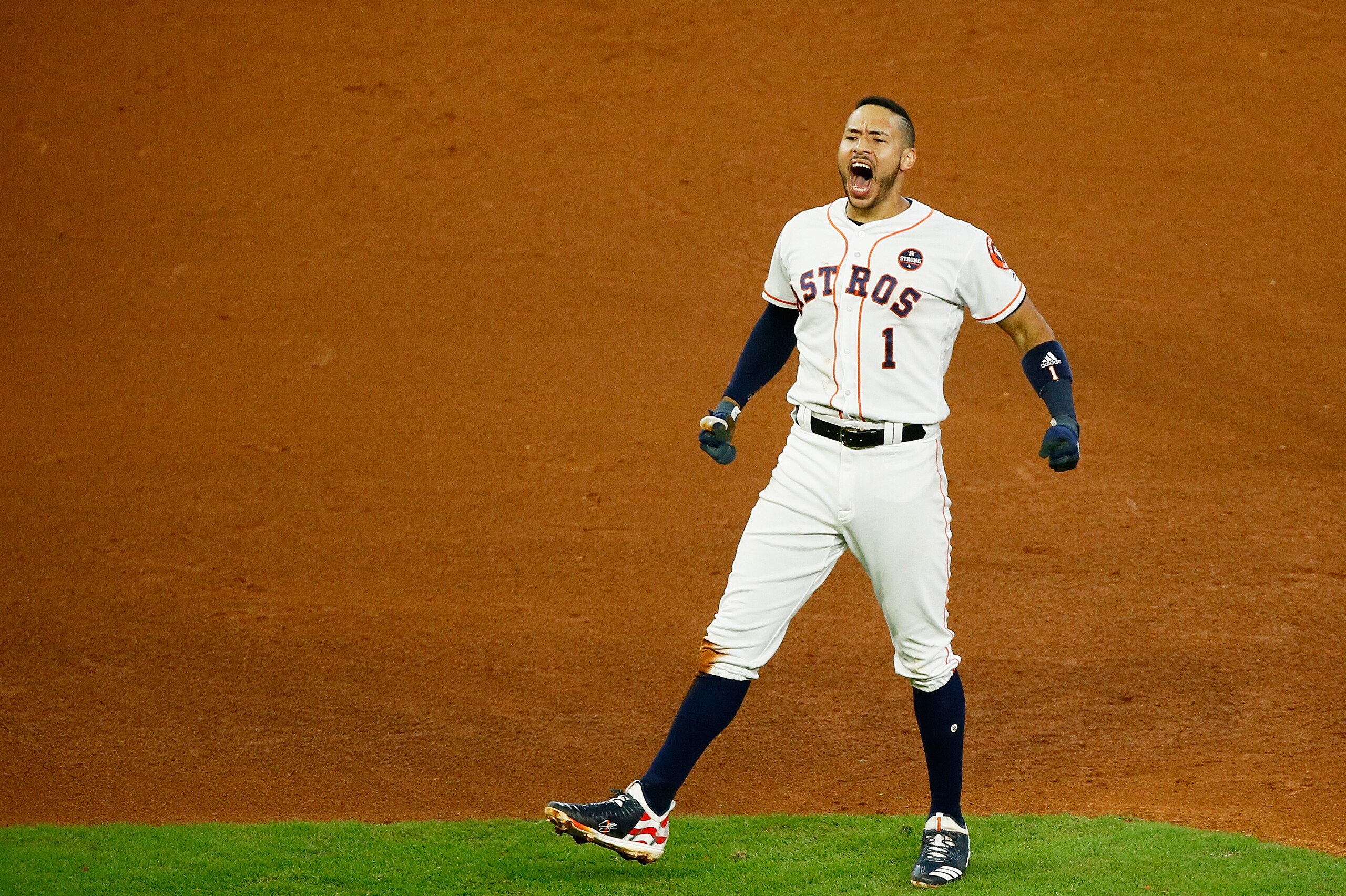 HOUSTON, TX - OCTOBER 14:  Carlos Correa #1 of the Houston Astros celebrates their 2 to 1 win over the New York Yankees in game two of the American League Championship Series at Minute Maid Park on October 14, 2017 in Houston, Texas.  (Photo by Bob Levey/