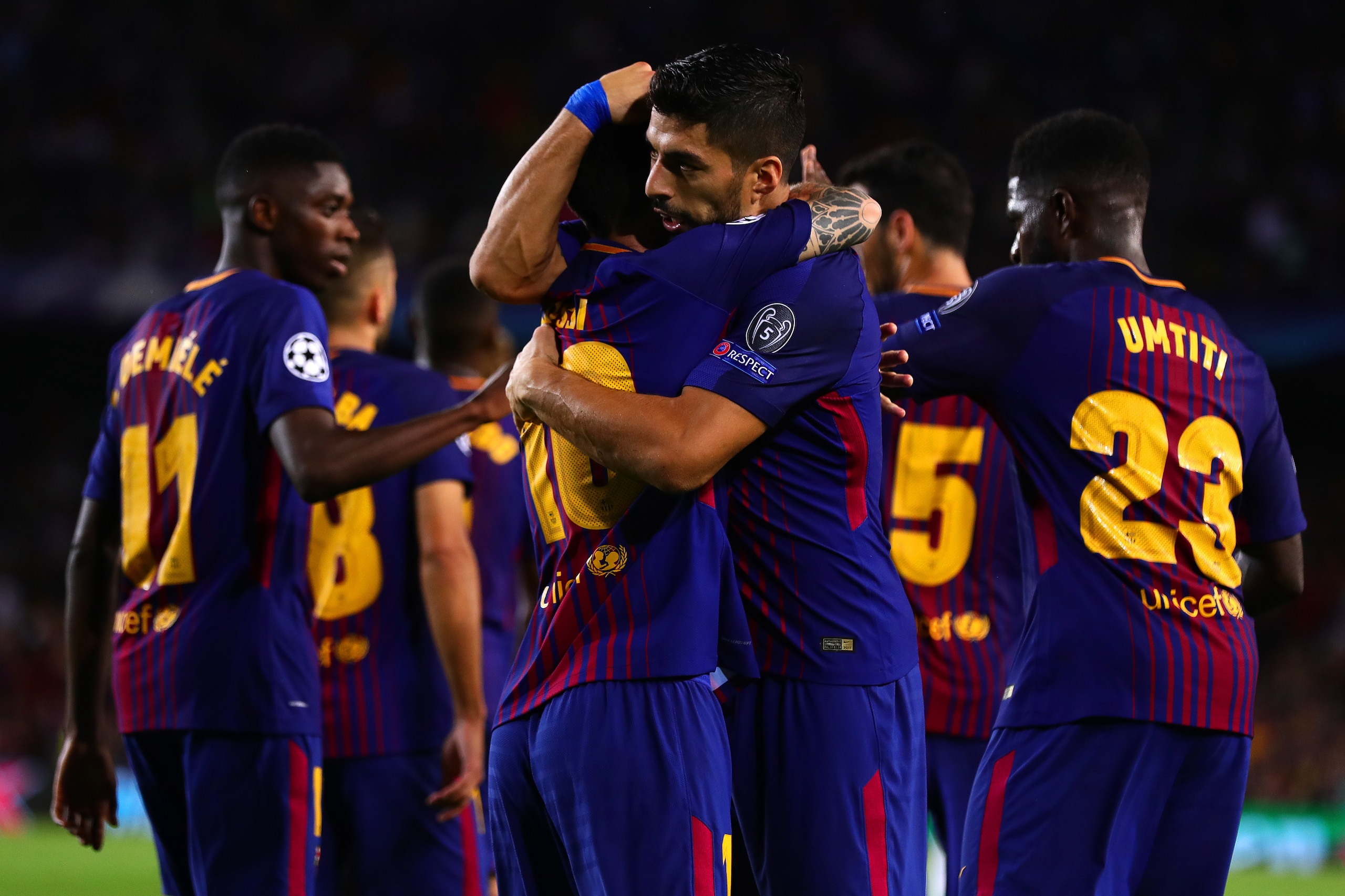 BARCELONA, SPAIN - SEPTEMBER 12: Lionel Messi of FC Barcelona is congratulated by team-mate Luis Suarez after scoring the opening goal during the UEFA Champions League Group D match between FC Barcelona and Juventus at Camp Nou on September 12, 2017 in Ba