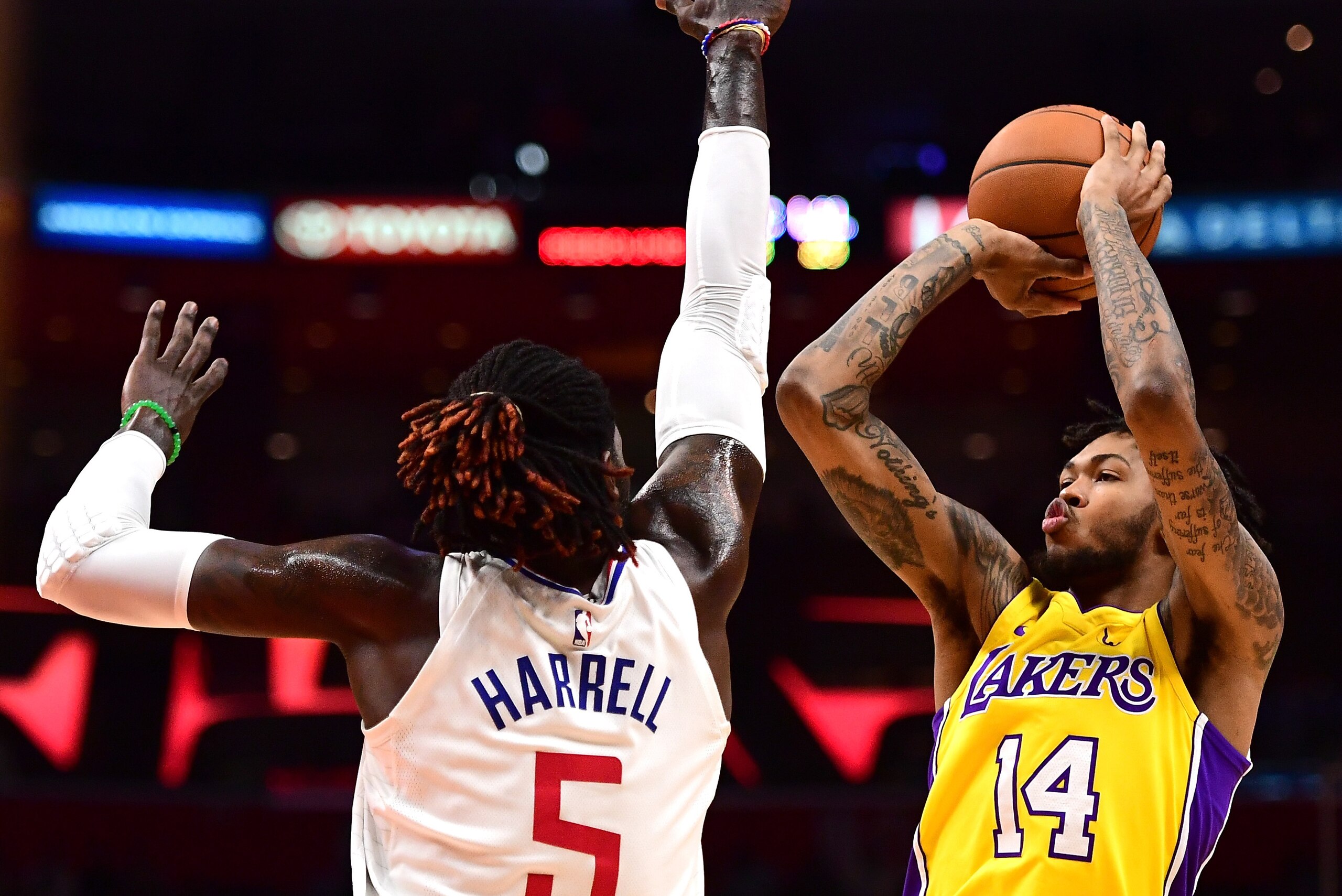 LOS ANGELES, CA - OCTOBER 13:  Brandon Ingram #14 of the Los Angeles Lakers shoots a jumper over Montrezl Harrell #5 of the LA Clippers during the first half at Staples Center on October 10, 2017 in Los Angeles, California.  (Photo by Harry How/Getty Imag