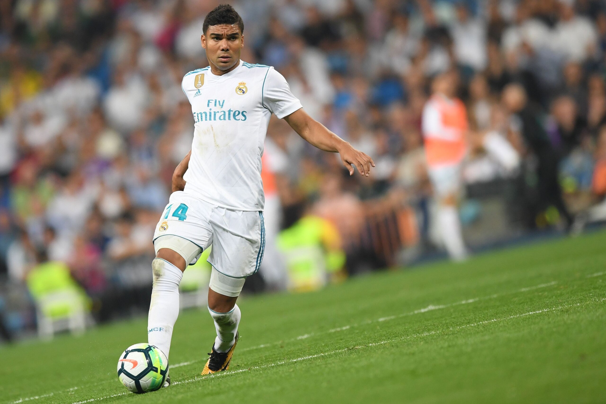 Real Madrid's midfielder from Brazil Casemiro controls the ball during the Spanish league football match Real Madrid CF against Real Betis  at the Santiago Bernabeu stadium in Madrid on September 20, 2017. / AFP PHOTO / GABRIEL BOUYS        (Photo credit 