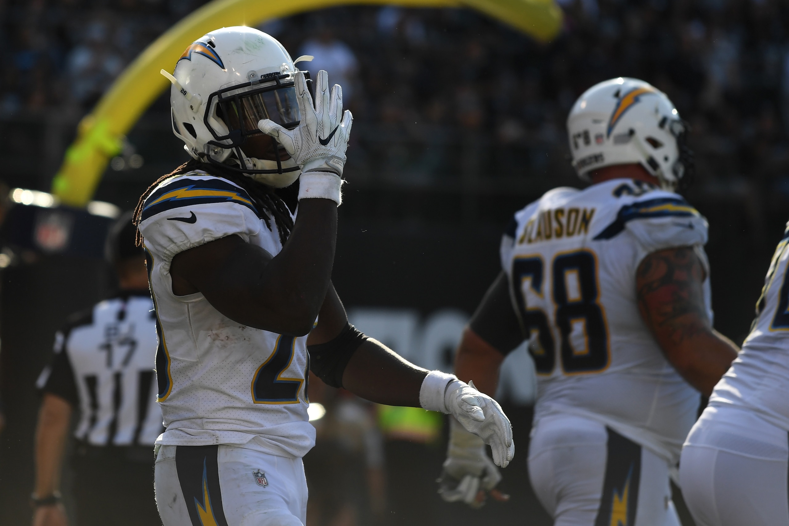 OAKLAND, CA - OCTOBER 15:  Melvin Gordon #28 of the Los Angeles Chargers celebrates after scoring on a six-yard touchdown against the Oakland Raiders during their NFL game at Oakland-Alameda County Coliseum on October 15, 2017 in Oakland, California.  (Ph