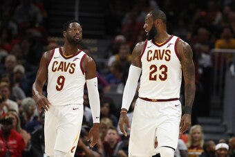 CLEVELAND, OH - OCTOBER 10: Dwyane Wade #9 of the Cleveland Cavaliers talks with LeBron James #23 while playing the Chicago Bulls during a pre season game at Quicken Loans Arena on October 10, 2017 in Cleveland, Ohio. NOTE TO USER: User expressly acknowle