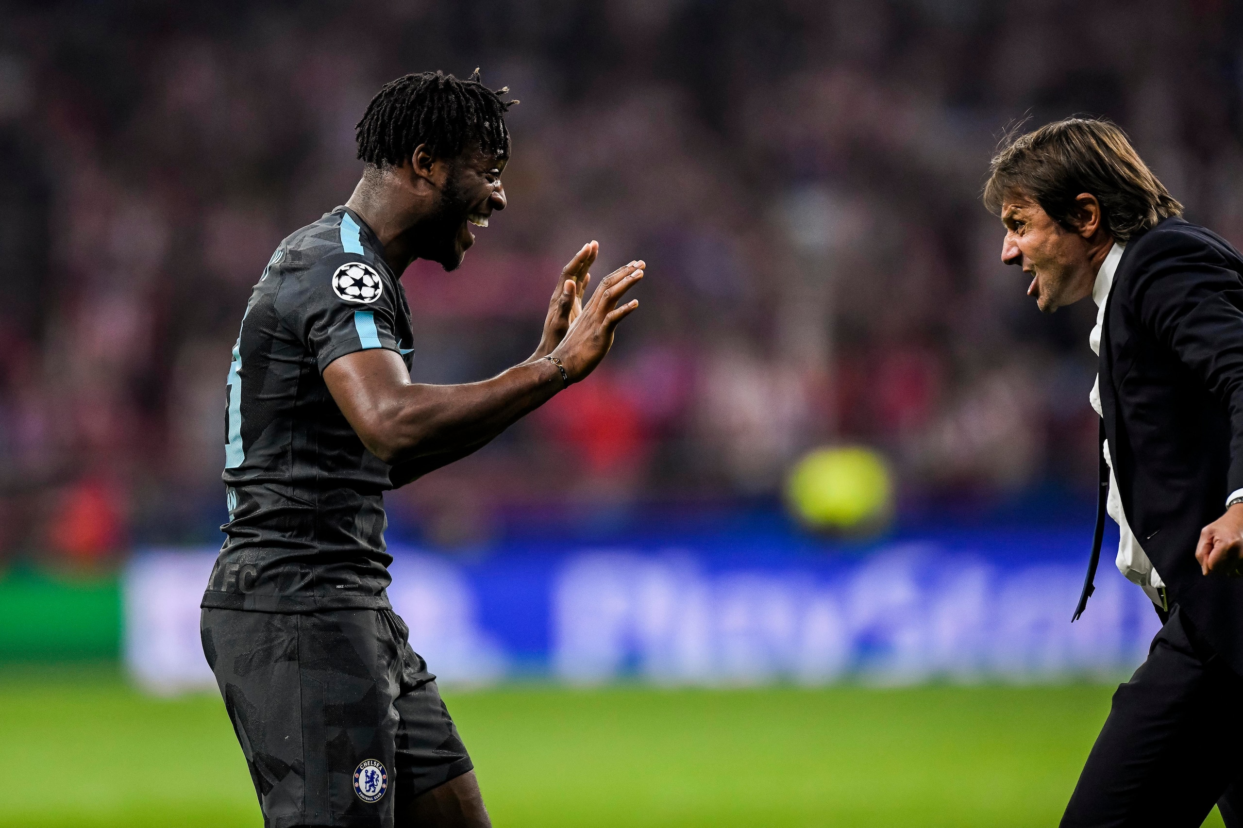 MADRID, SPAIN - SEPTEMBER 27: Michy Batshuayi (l) of Chelsea FC celebrates with coach Antonio Conte during the UEFA Champions League 2017-18 match between Atletico de Madrid and Chelsea FC at the Wanda Metropolitano on 27 September 2017, in Madrid, Spain. MADRID, SPAIN - SEPTEMBER 27: Michy Batshuayi (l) of Chelsea FC celebrates with coach Antonio Conte during the UEFA Champions League 2017-18 match between Atletico de Madrid and Chelsea FC at the Wanda Metropolitano on 27 September 2017, in Madrid, Spain.