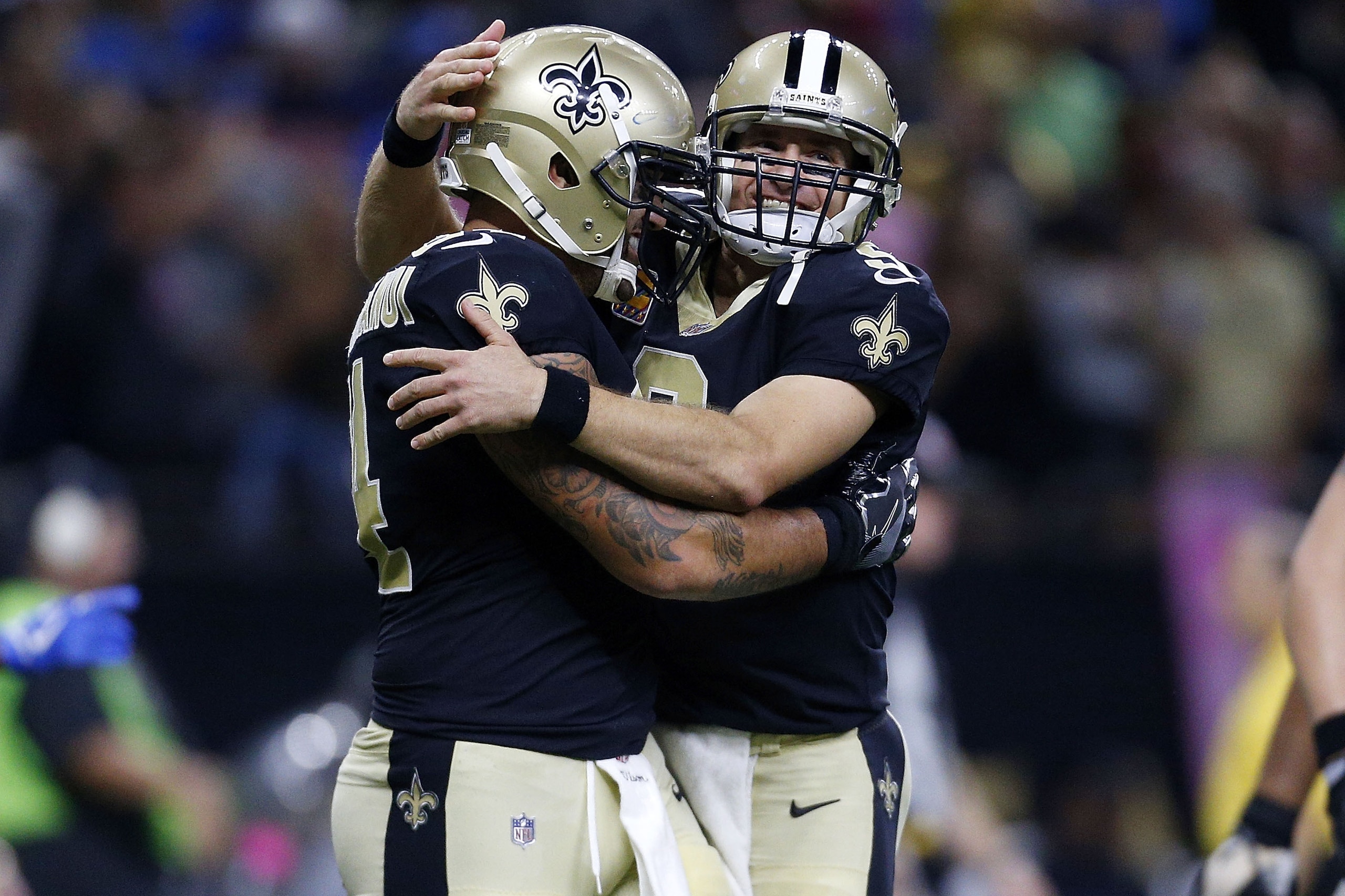 NEW ORLEANS, LA - OCTOBER 15:  Drew Brees #9 of the New Orleans Saints and Michael Hoomanawanui #84 celebrate a touchdown during the second half of a game against the Detroit Lions at the Mercedes-Benz Superdome on October 15, 2017 in New Orleans, Louisia