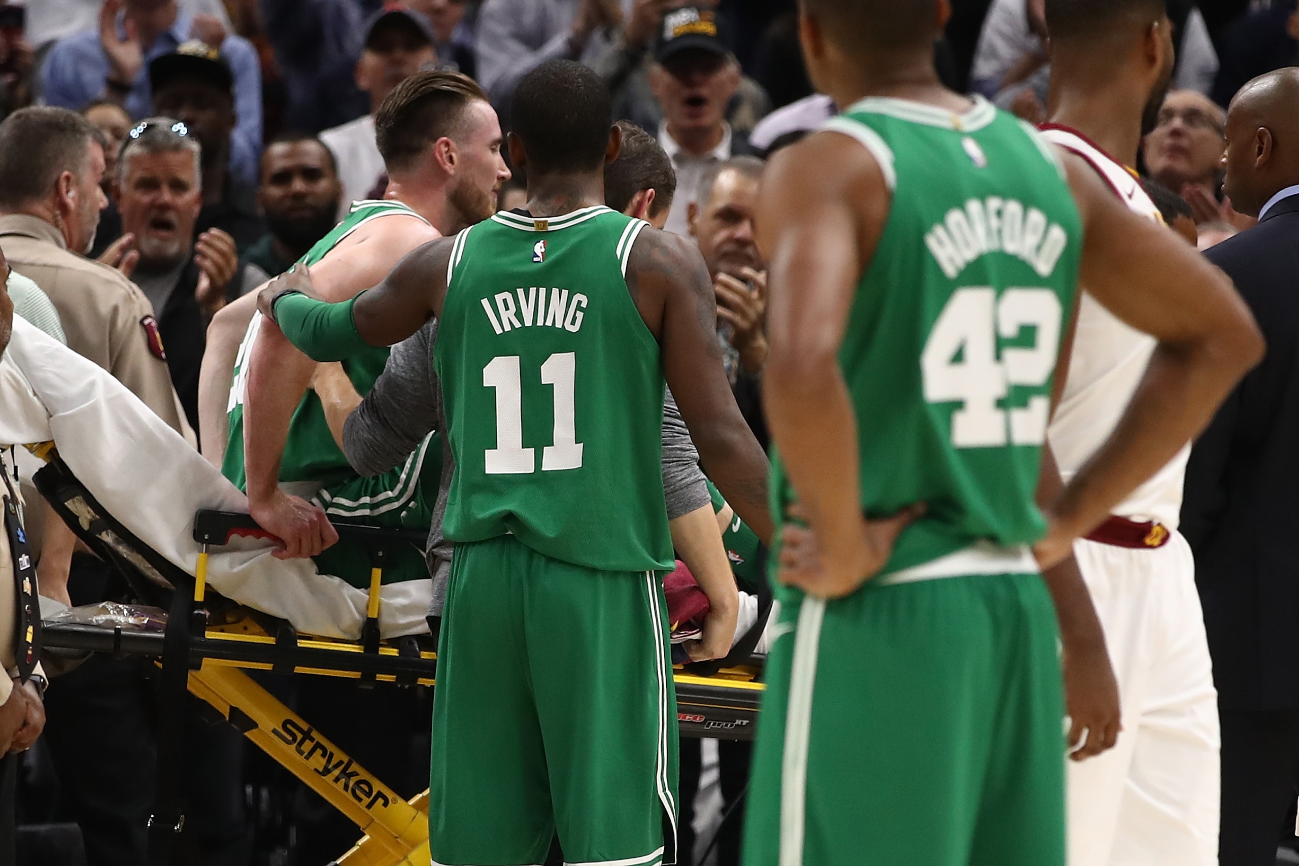 CLEVELAND, OH - OCTOBER 17:  Kyrie Irving #11 of the Boston Celtics consoles Gordon Hayward #20 after Hayward was injured while playing the Cleveland Cavaliers at Quicken Loans Arena on October 17, 2017 in Cleveland, Ohio. NOTE TO USER: User expressly ack