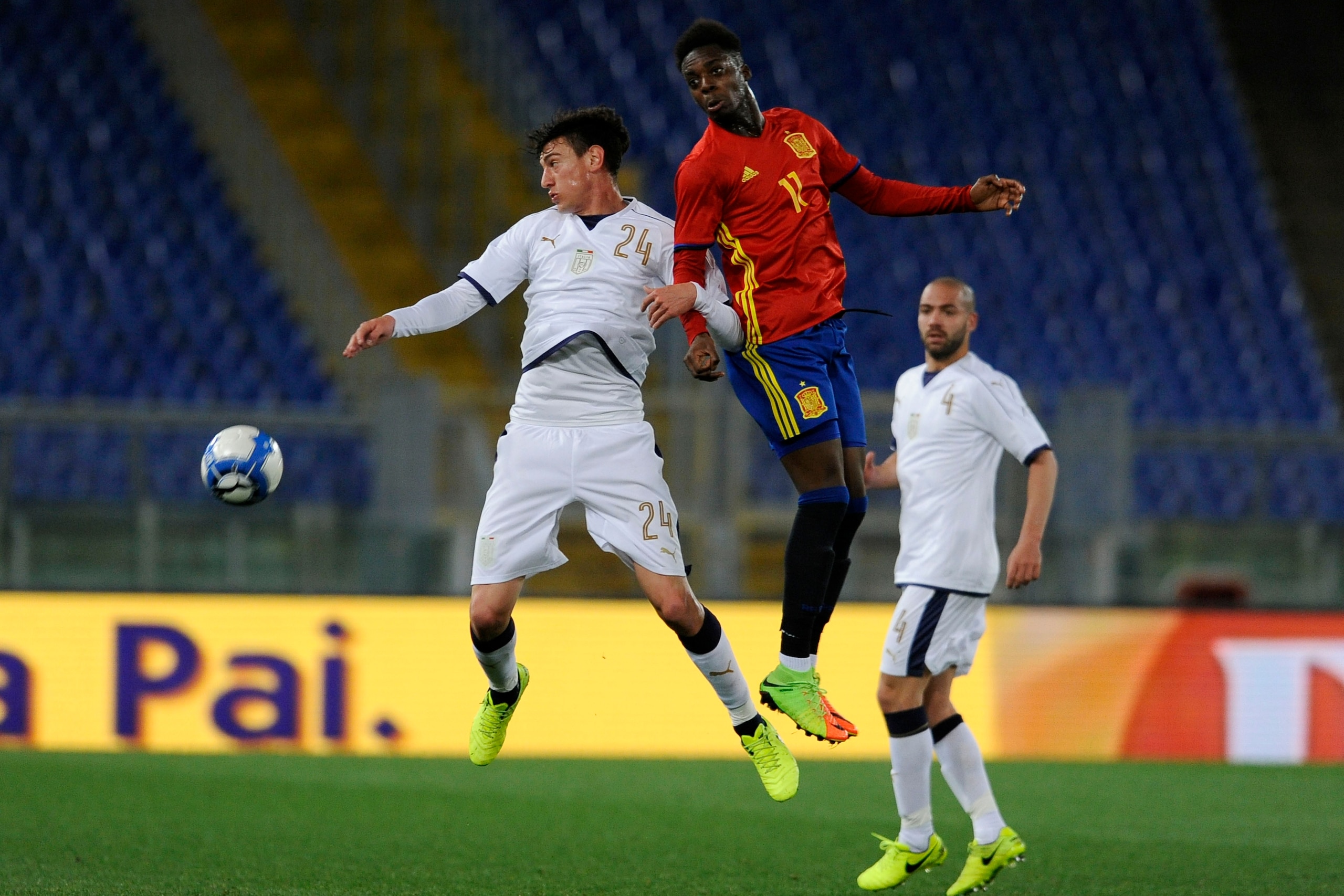 ROME, ITALY - MARCH 27:  Alex Ferrari of Italy U21 ompete for the ball with Inaki Williams during the international friendly match between Italy U21 and Spain U21 at Olimpico Stadium on March 27, 2017 in Rome, Italy.  (Photo by Marco Rosi/Getty Images)