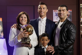Ronaldo and his son Cristiano Jr. celebrate the 2016 Ballon d'Or with Hugo (right) and Ronaldo's mother, Dolores.